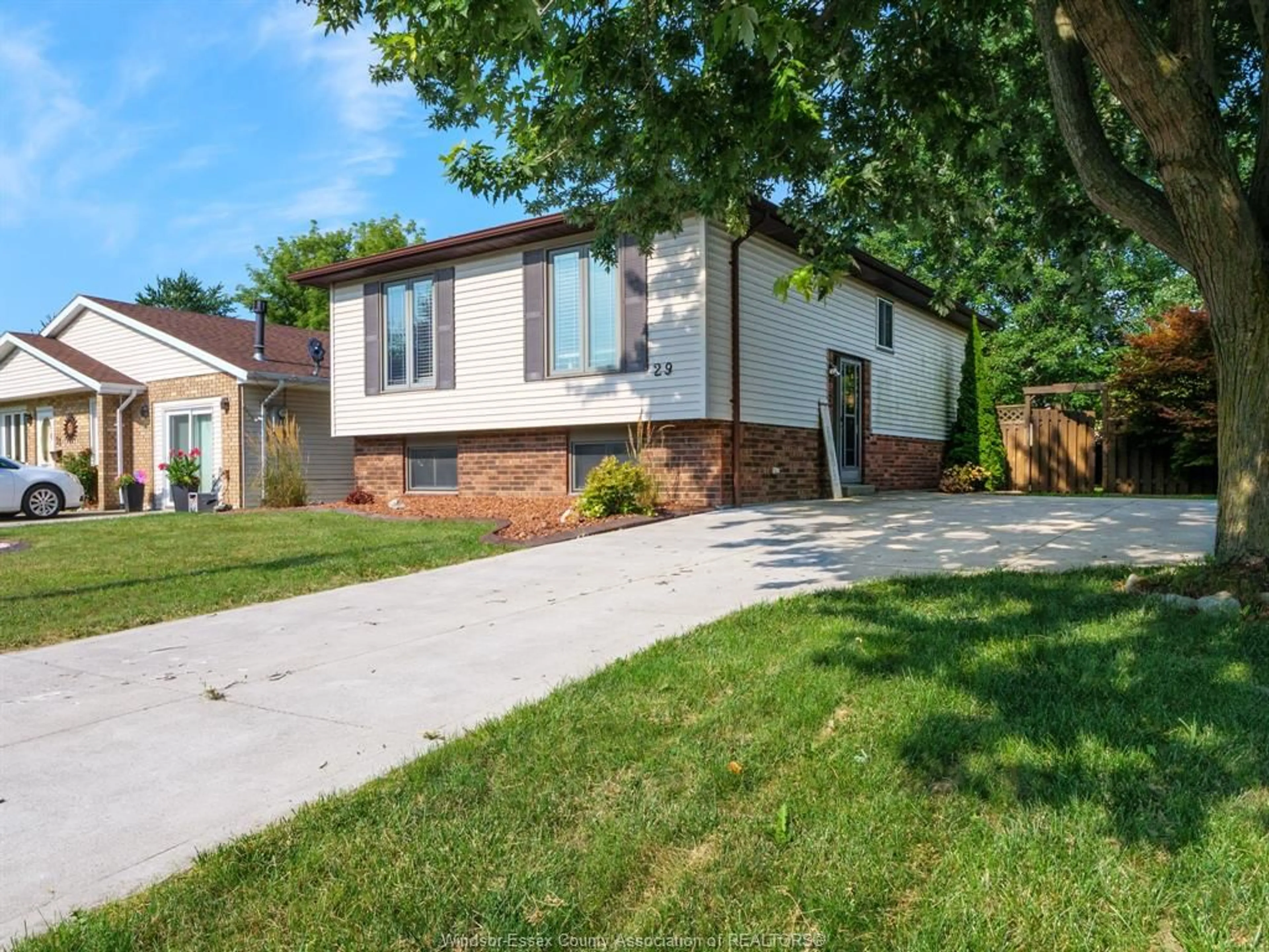 Home with brick exterior material, street for 29 Kentucky Ave, Amherstburg Ontario N9V 3S7