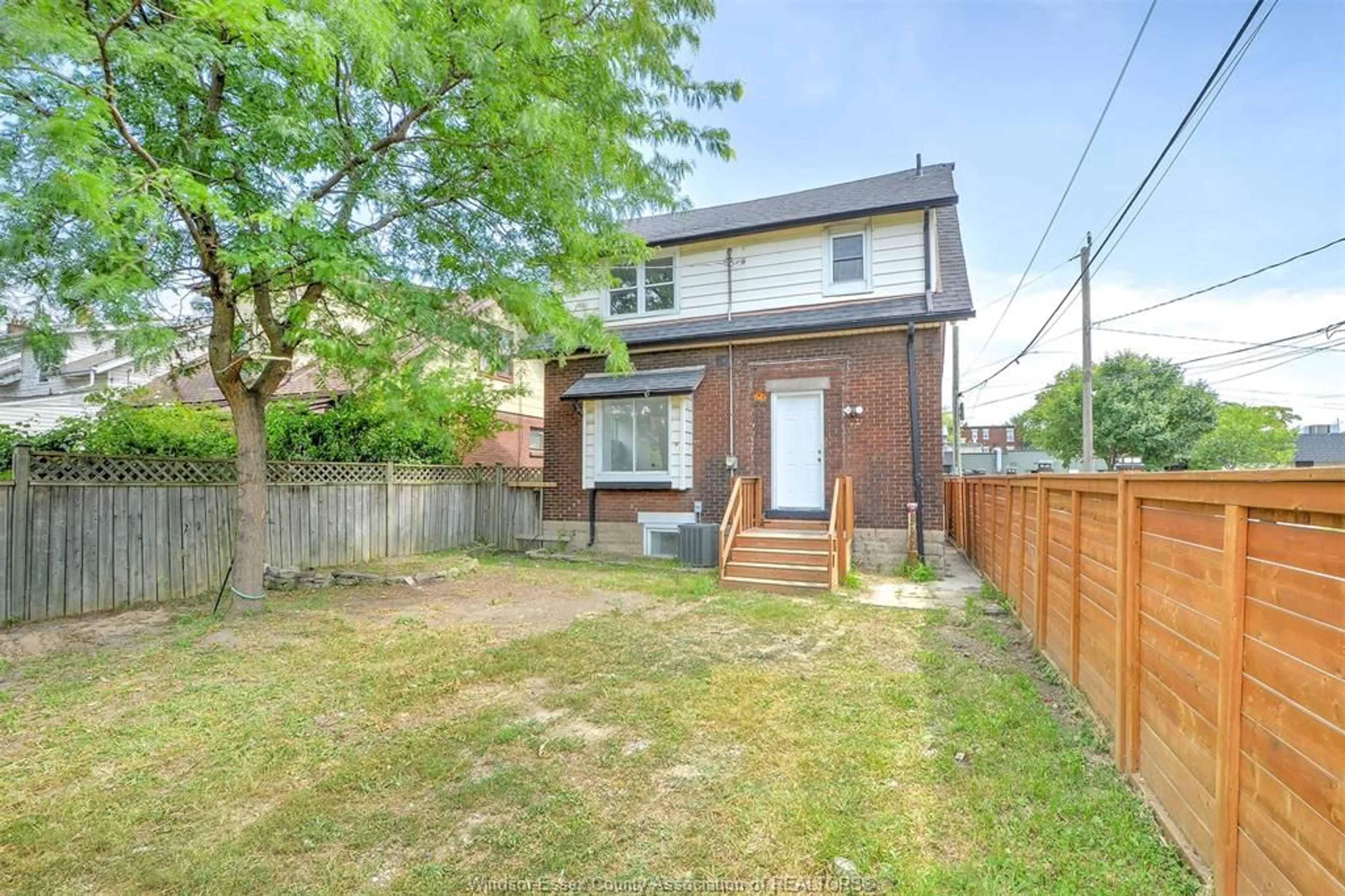 Home with brick exterior material, street for 273 MCEWAN, Windsor Ontario N9B 2E3