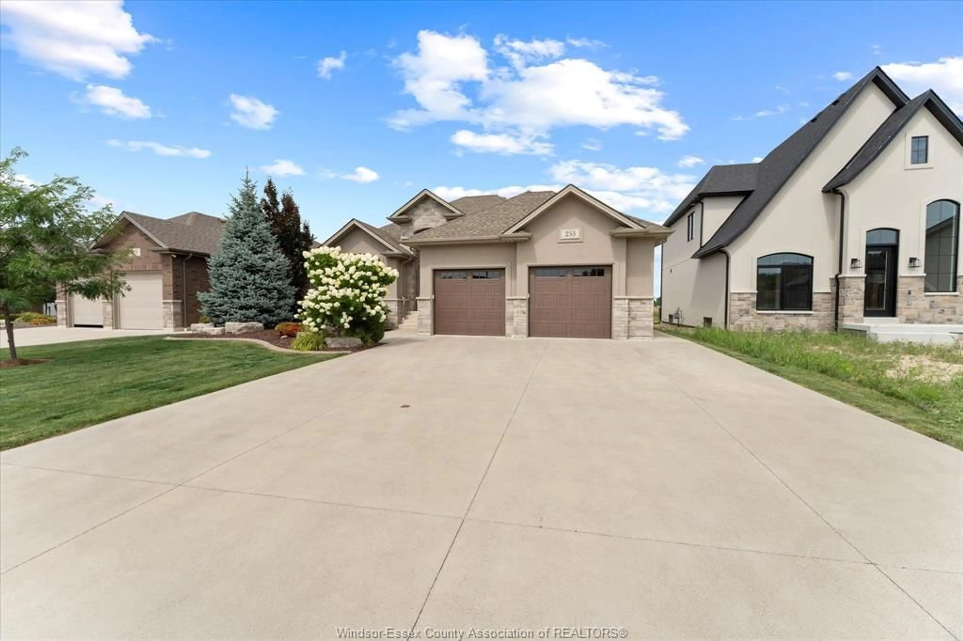 A pic from outside/outdoor area/front of a property/back of a property/a pic from drone, street for 255 Joan Flood Drive, Essex Ontario N8M 0C6