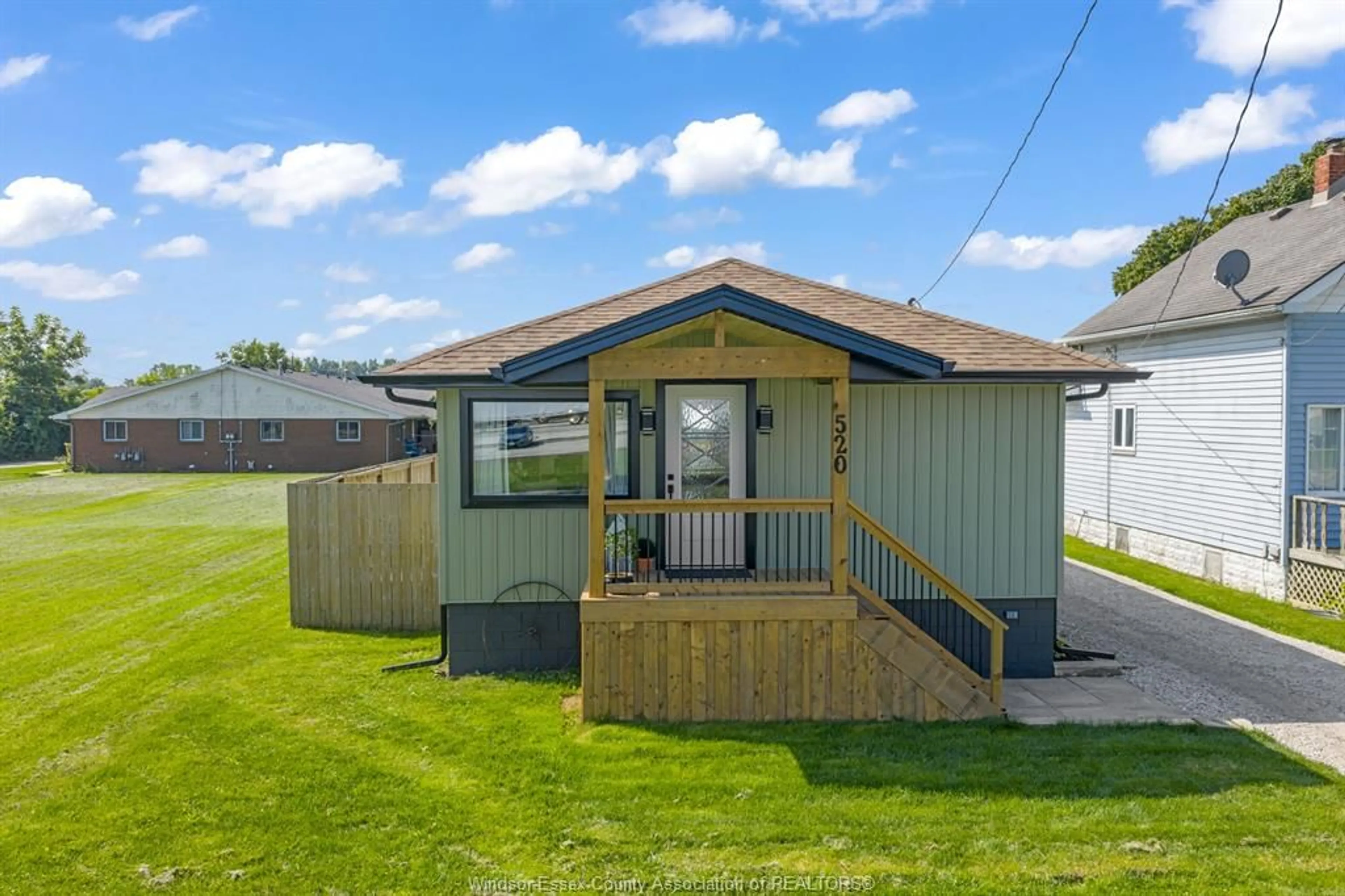 A pic from outside/outdoor area/front of a property/back of a property/a pic from drone, unknown for 520 Mersea Rd 3, Leamington Ontario N8H 3V5