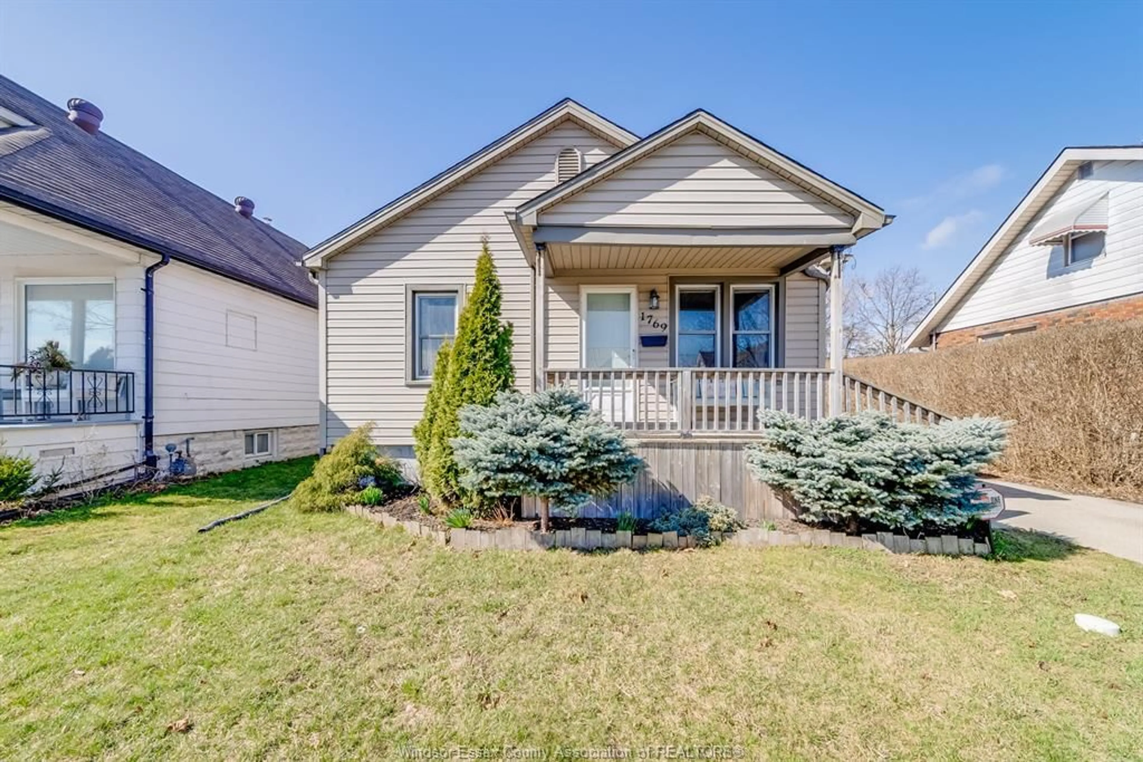 Home with vinyl exterior material, street for 1769 HICKORY, Windsor Ontario N8Y 3T4