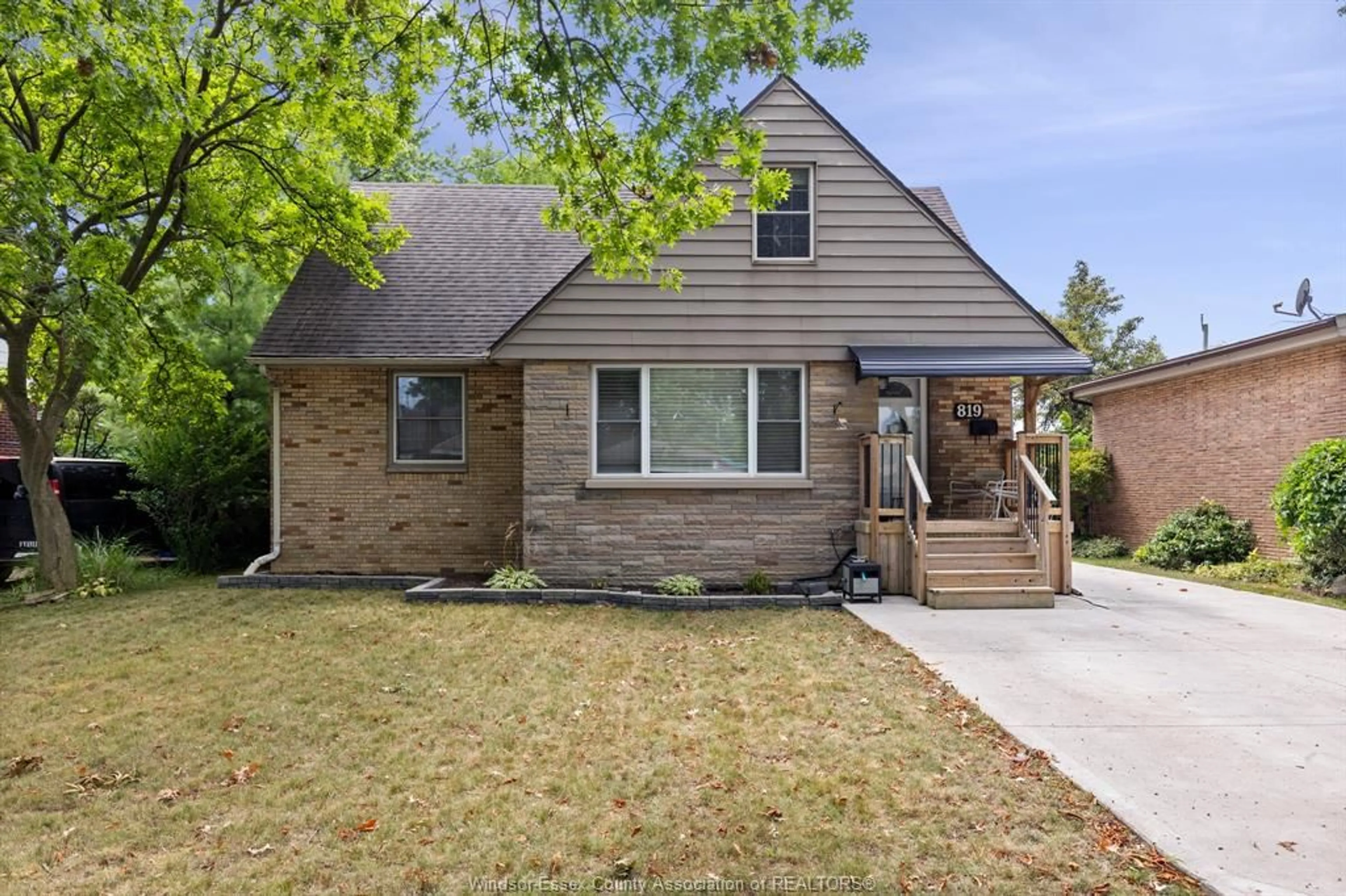 Home with brick exterior material, street for 819 ROSSINI Blvd, Windsor Ontario N8Y 2Z2
