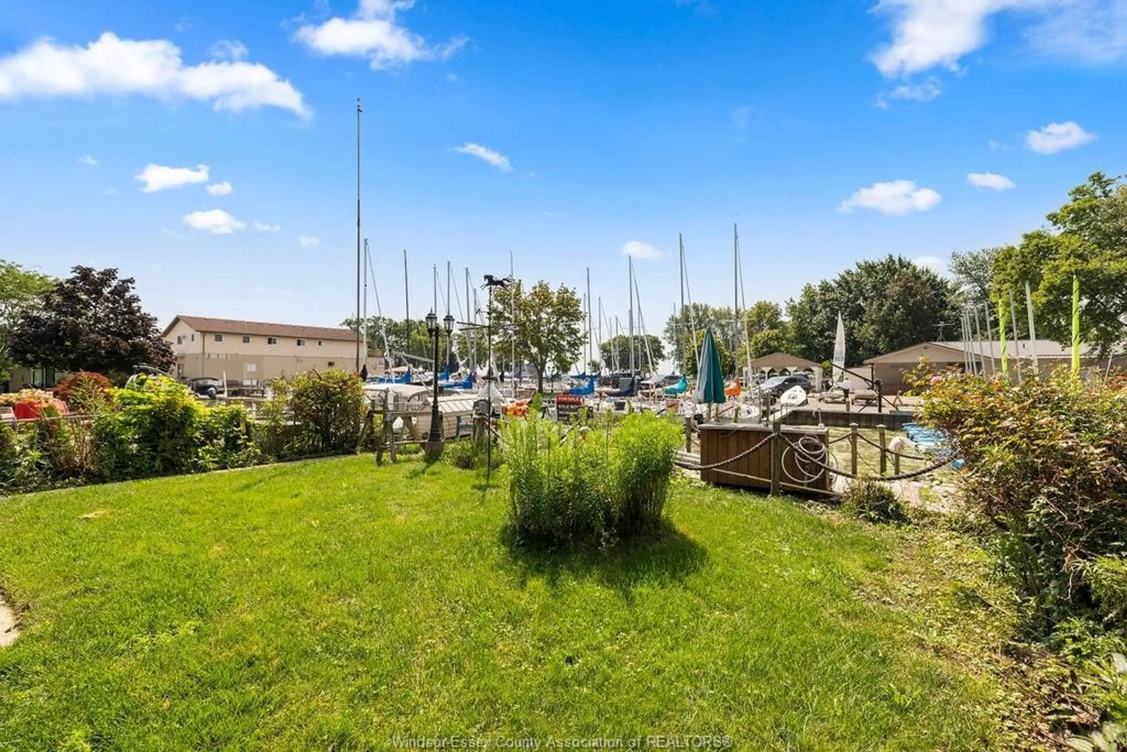 A pic from outside/outdoor area/front of a property/back of a property/a pic from drone, water/lake/river/ocean view for 903 LORNA St, Kingsville Ontario N9Y 3V4