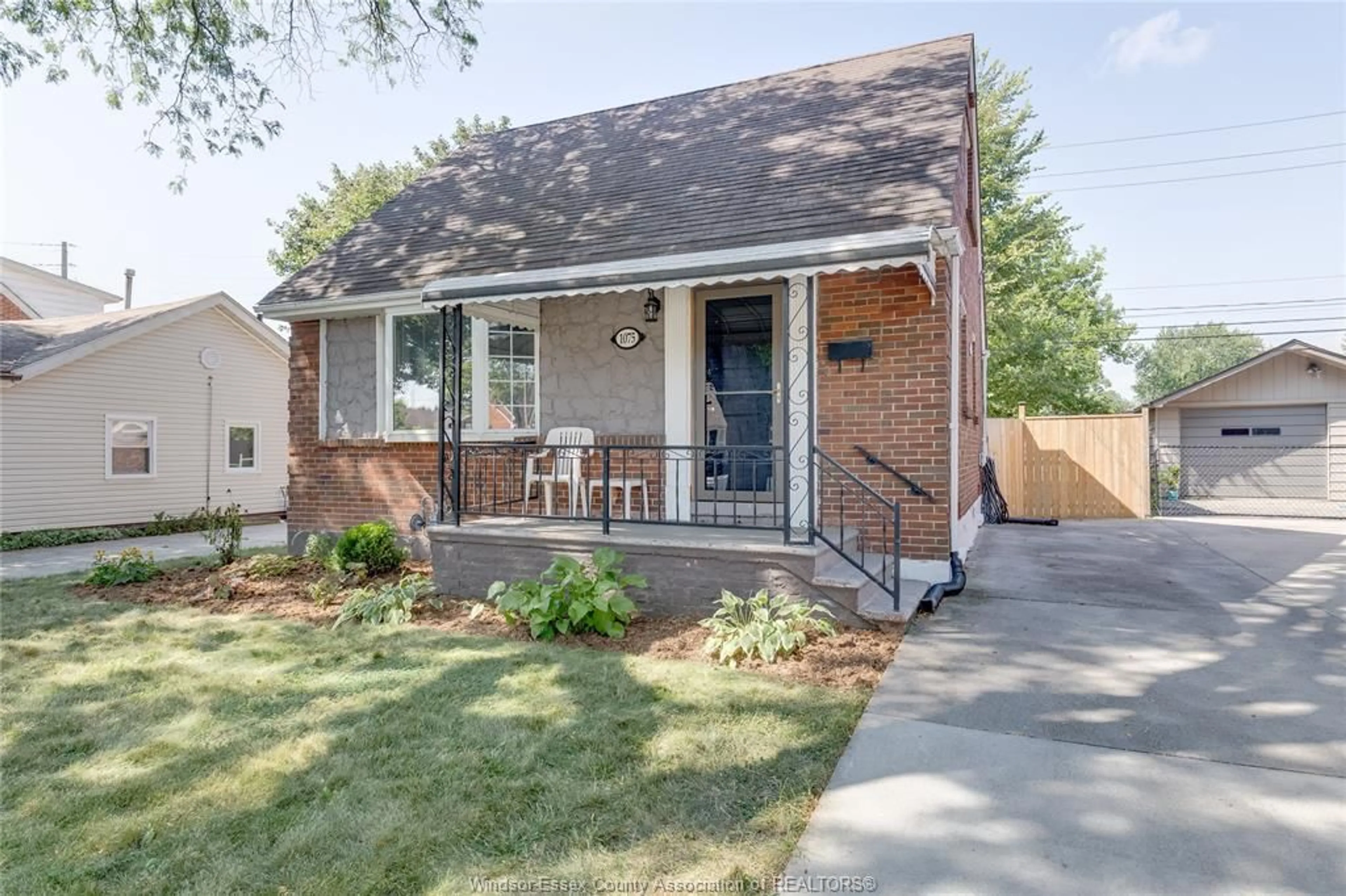Home with brick exterior material, street for 1075 PRADO Pl, Windsor Ontario N8S 2H6