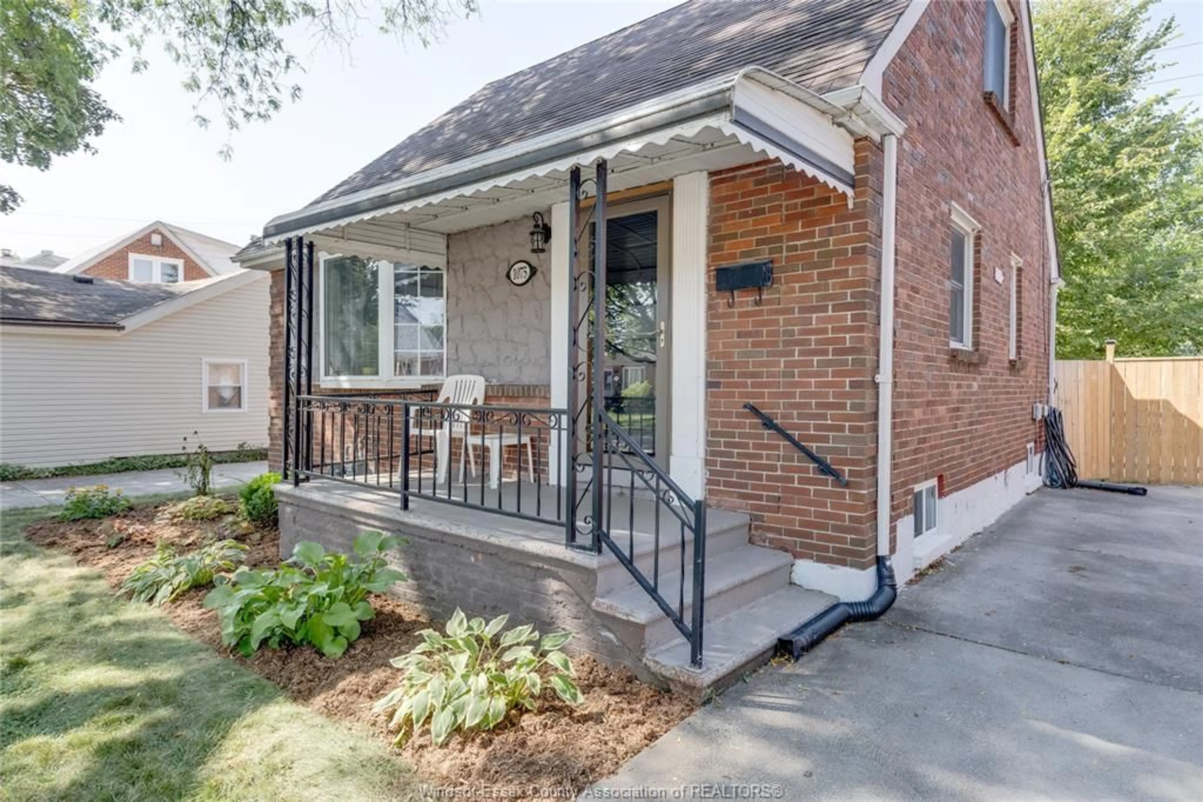 Home with brick exterior material, street for 1075 PRADO Pl, Windsor Ontario N8S 2H6