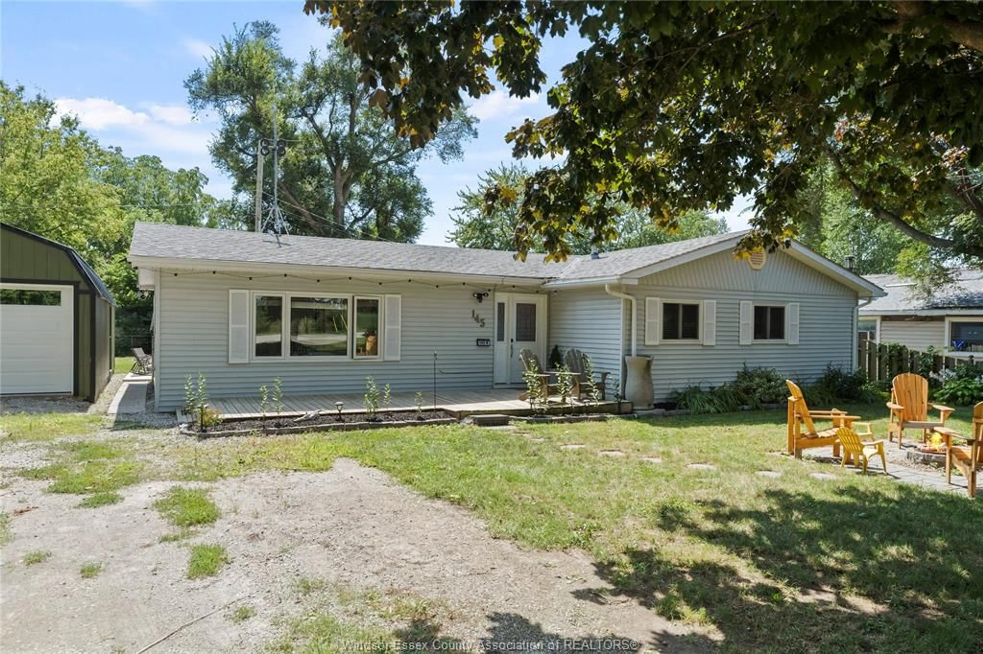 Home with vinyl exterior material, street for 145 COUNTY RD 50 W, Harrow Ontario N0R 1G0