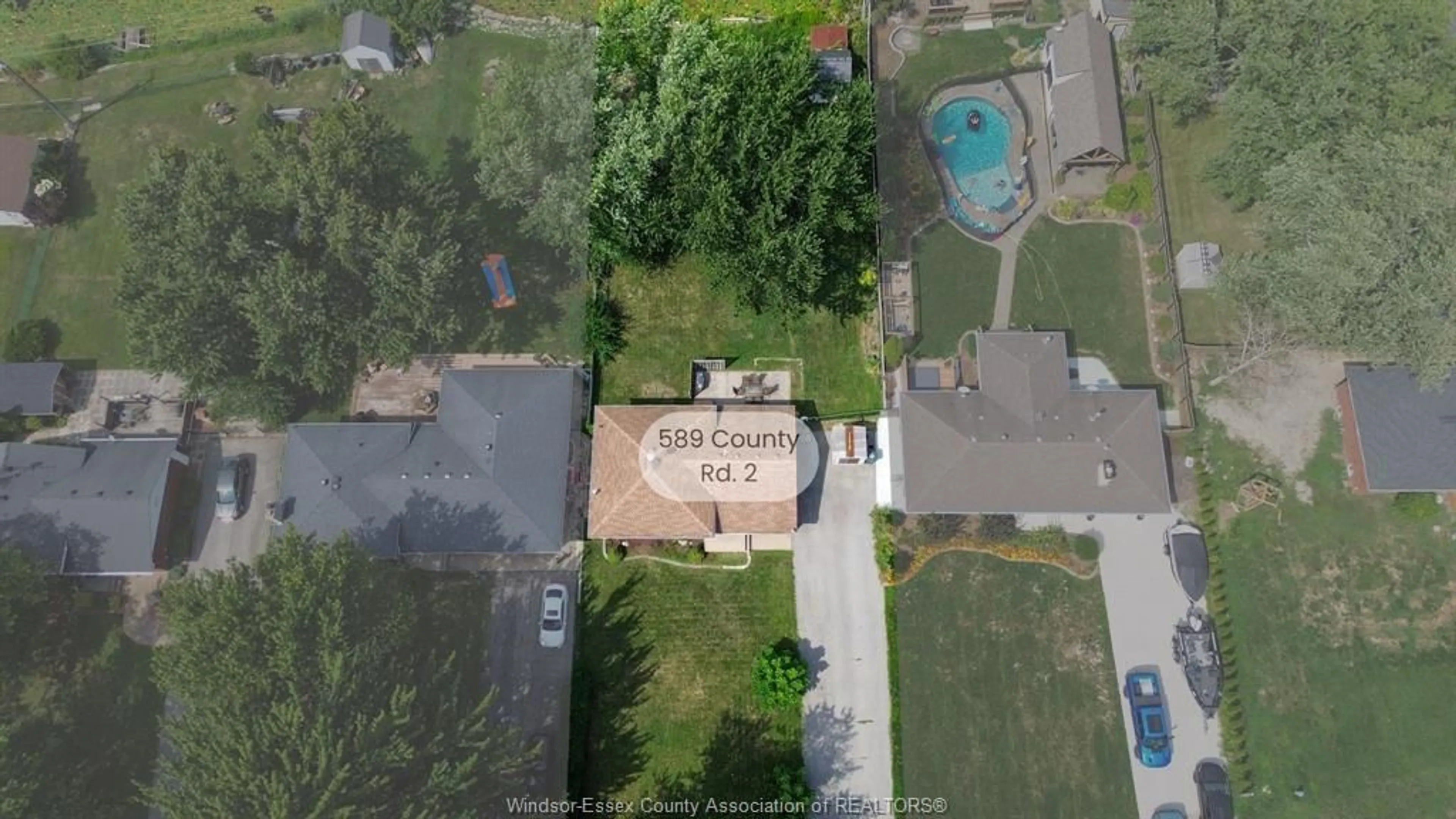 A pic from outside/outdoor area/front of a property/back of a property/a pic from drone, unknown for 589 COUNTY ROAD 2, Belle River Ontario N0R 1A0
