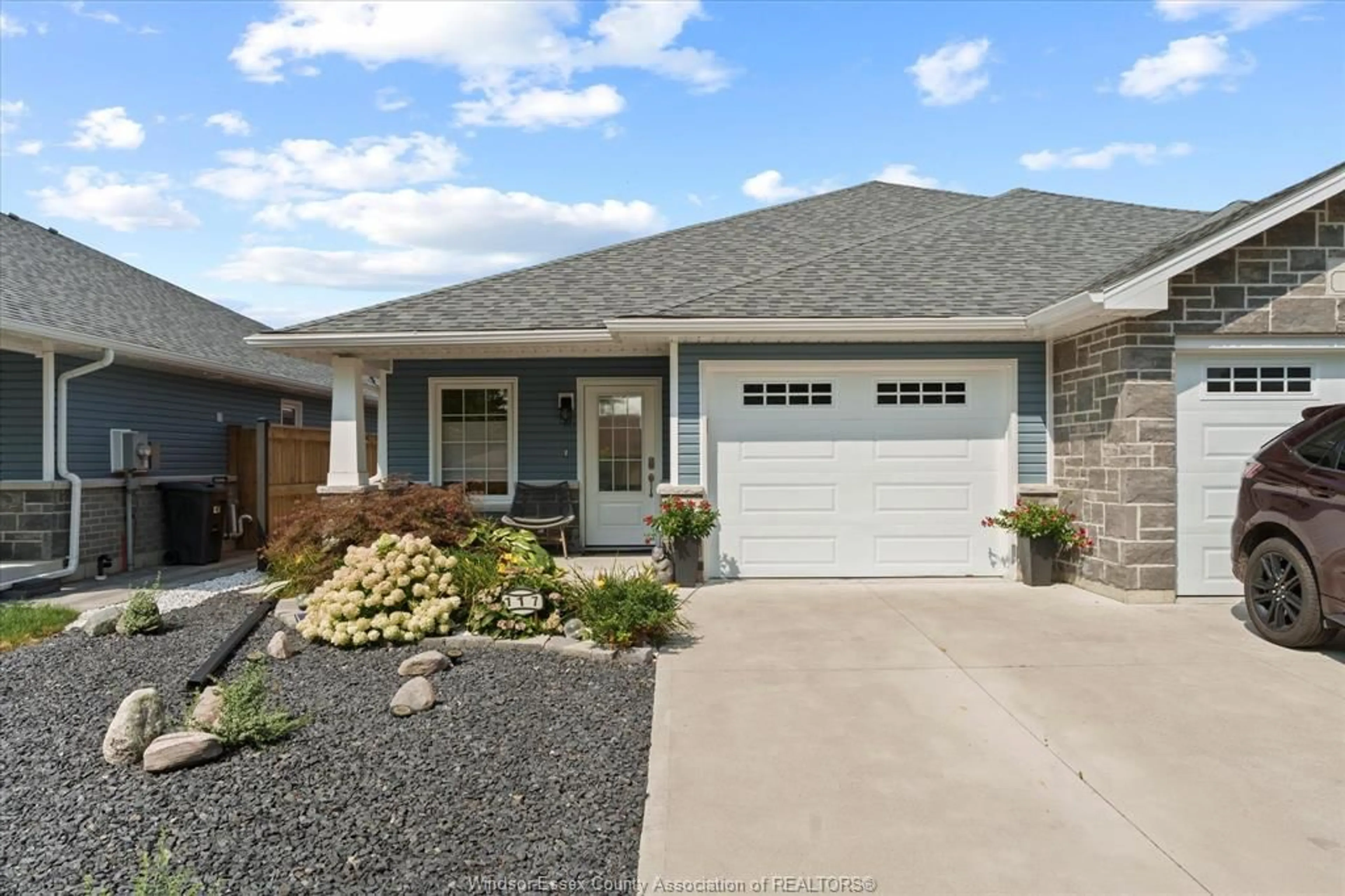 Home with vinyl exterior material, street for 117 ARTHUR St, Harrow Ontario N0R 1G0