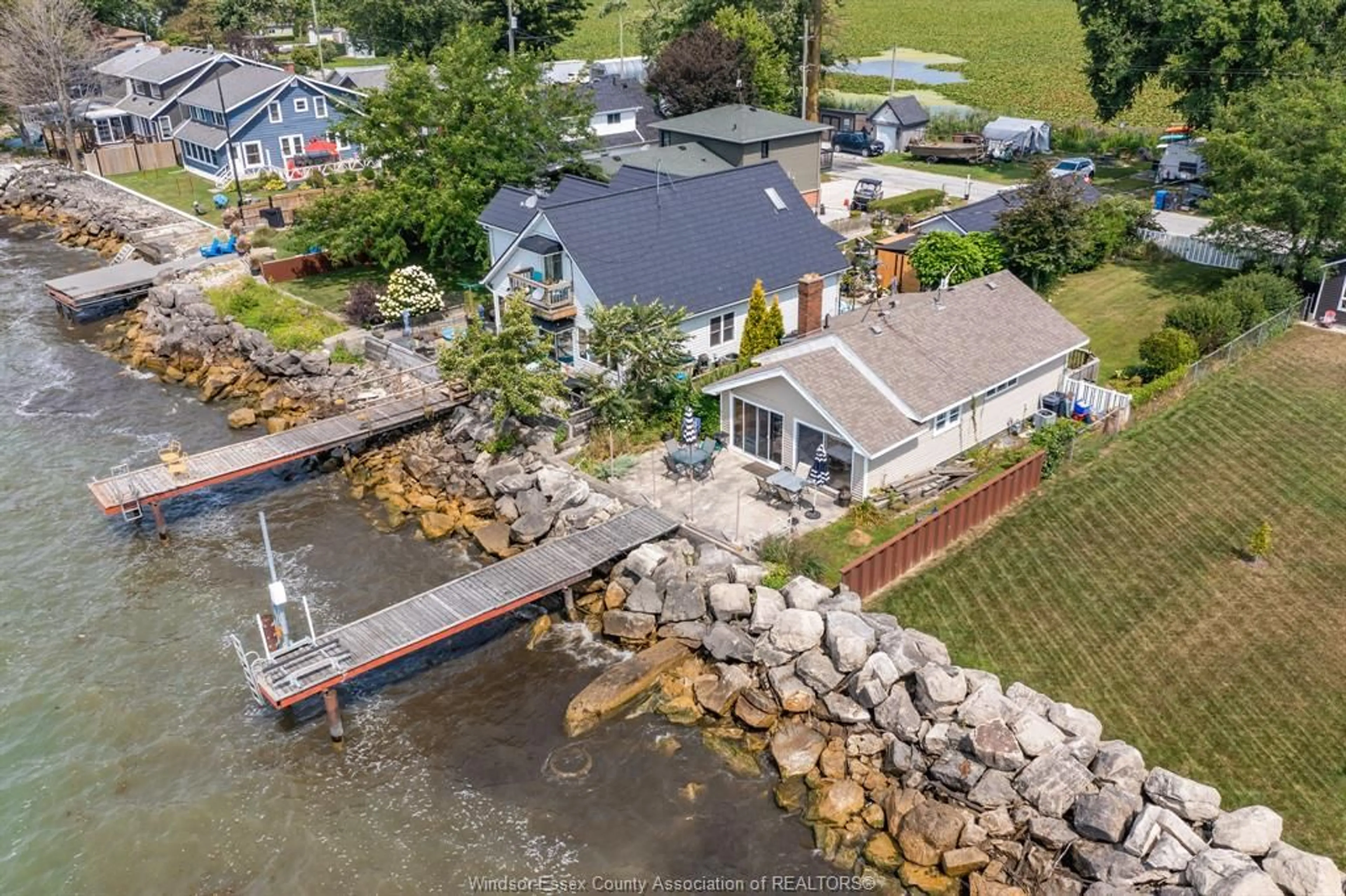 A pic from outside/outdoor area/front of a property/back of a property/a pic from drone, water/lake/river/ocean view for 499 LAKESIDE Dr, Harrow Ontario N0R 1G0