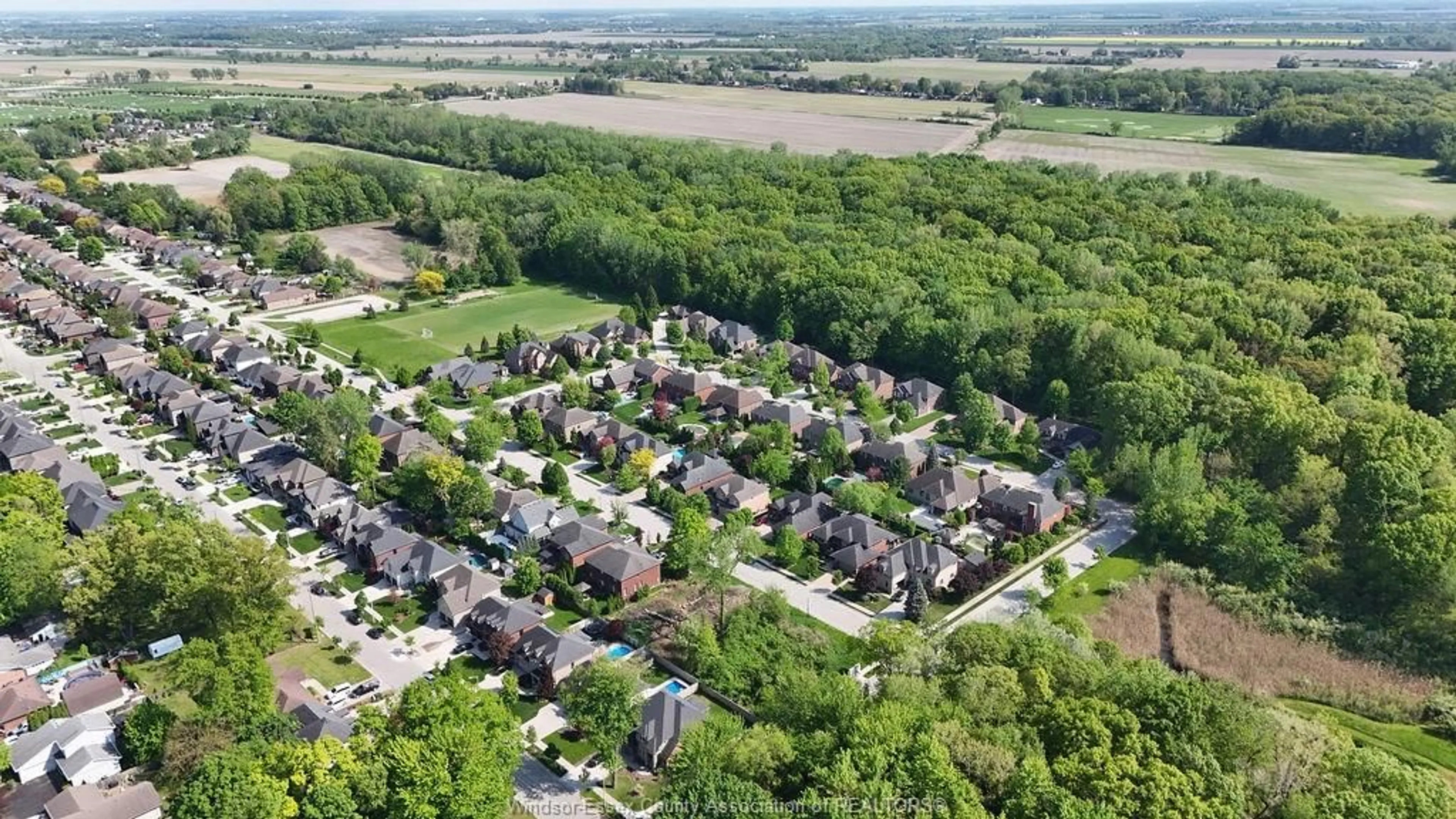 A pic from outside/outdoor area/front of a property/back of a property/a pic from drone, street for 1220 LYONS Ave, LaSalle Ontario N9J 3Y6