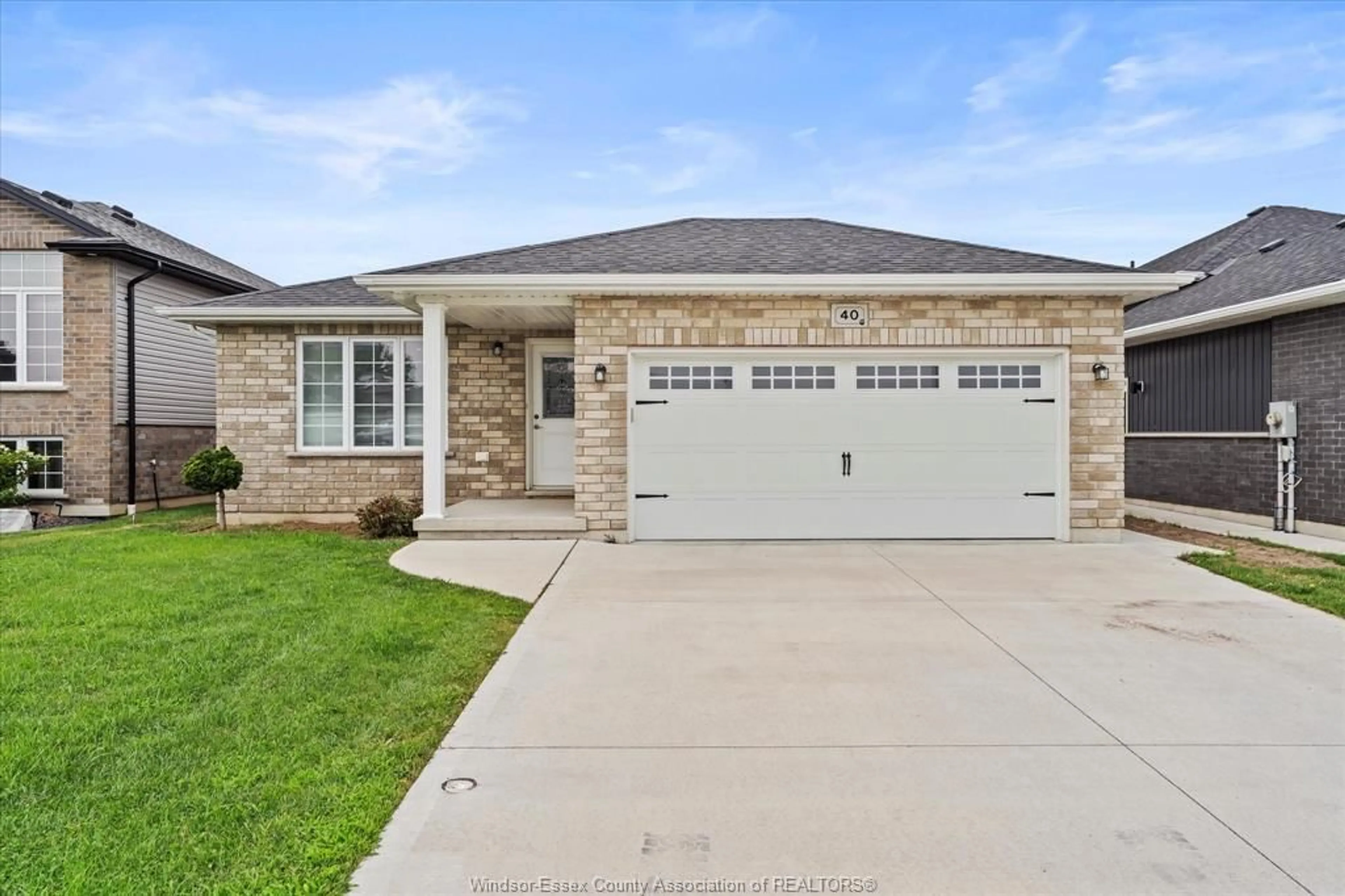 Home with brick exterior material, street for 40 REGAL Dr, Tilbury Ontario N0P 2L0