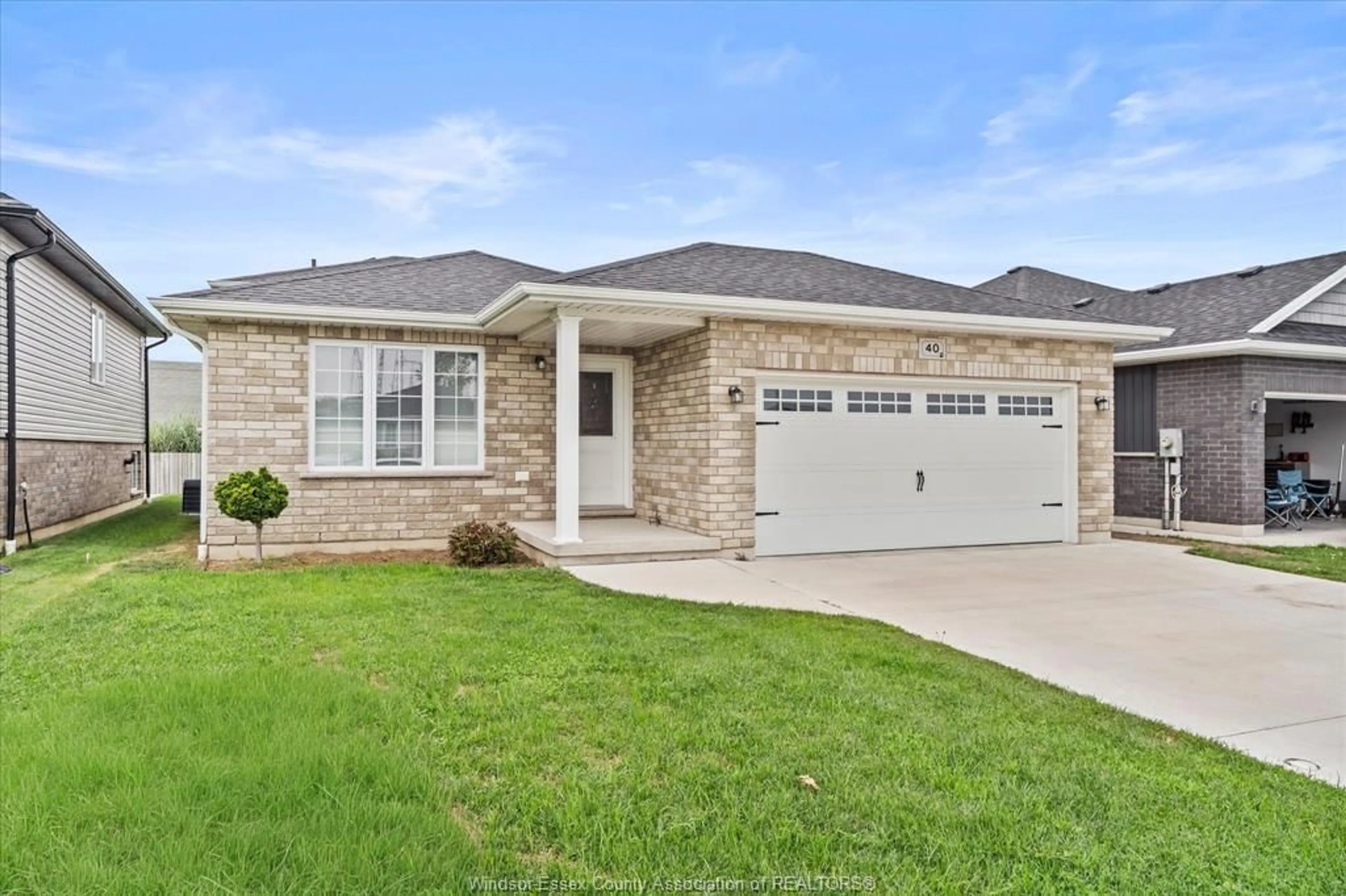 Home with brick exterior material, street for 40 REGAL Dr, Tilbury Ontario N0P 2L0