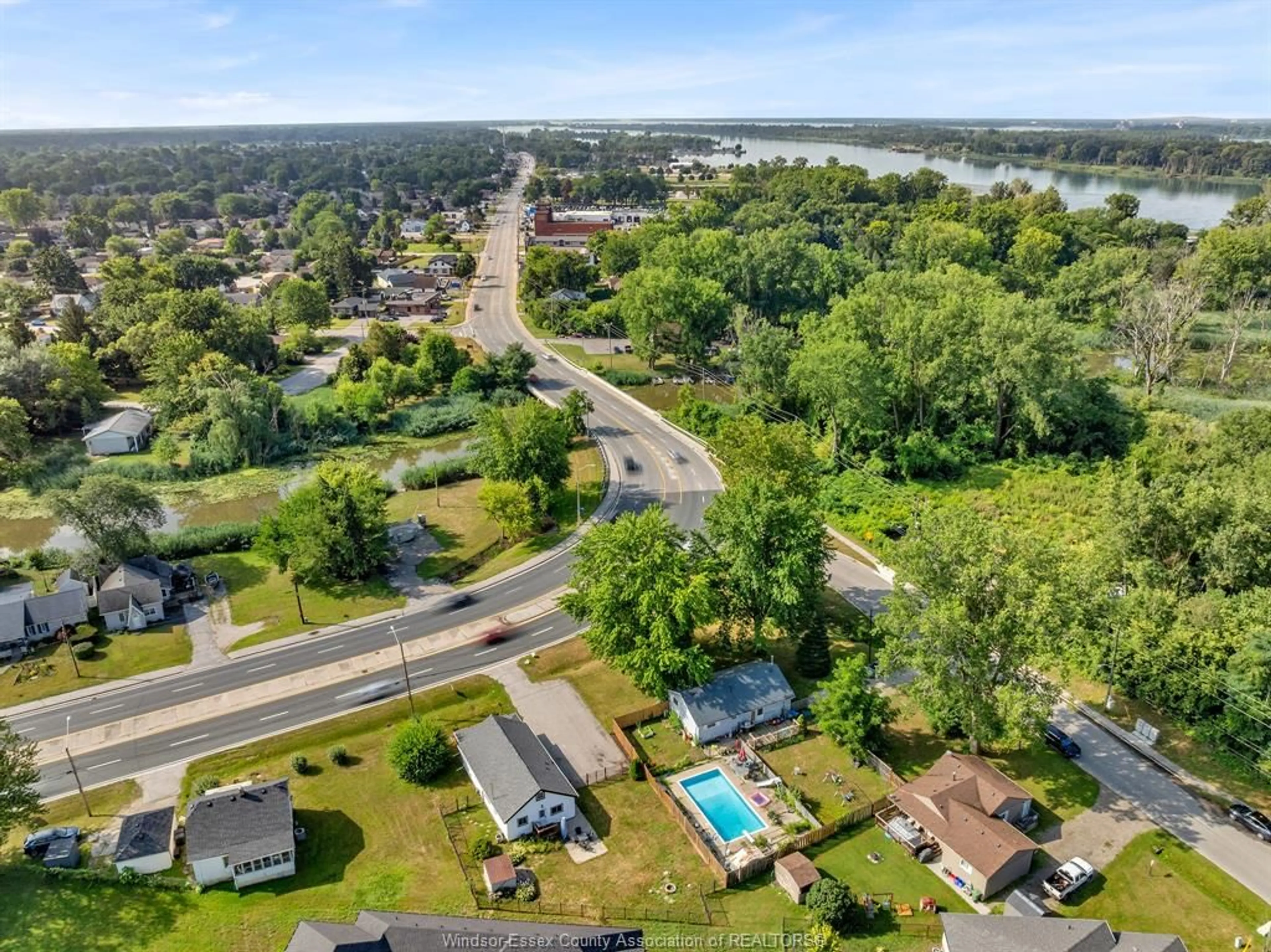 A pic from outside/outdoor area/front of a property/back of a property/a pic from drone, water/lake/river/ocean view for 310 HIGHWAY 18, LaSalle Ontario N9J 1Z7