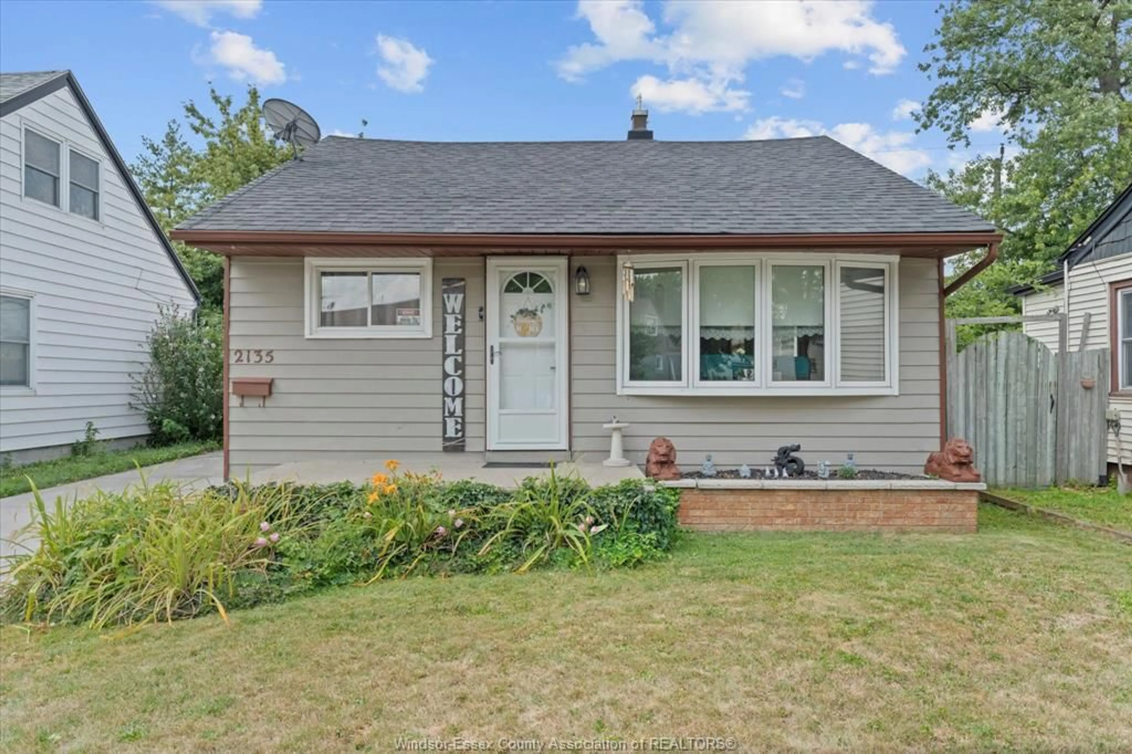 Home with vinyl exterior material, street for 2135 FOREST Ave, Windsor Ontario N8W 2G4