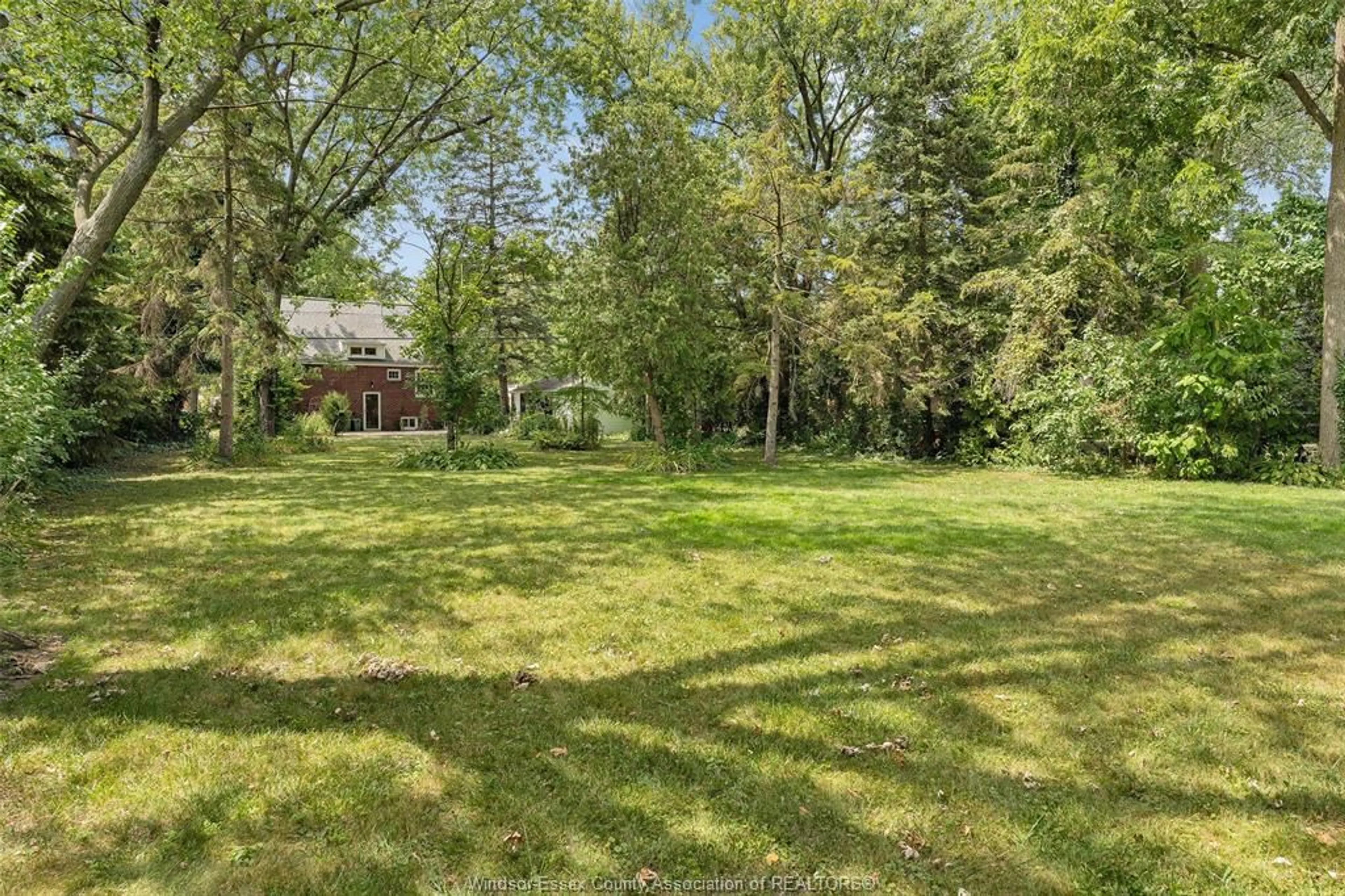 A pic from outside/outdoor area/front of a property/back of a property/a pic from drone, forest/trees view for V/L EASTLAWN, Windsor Ontario N8S 3G7