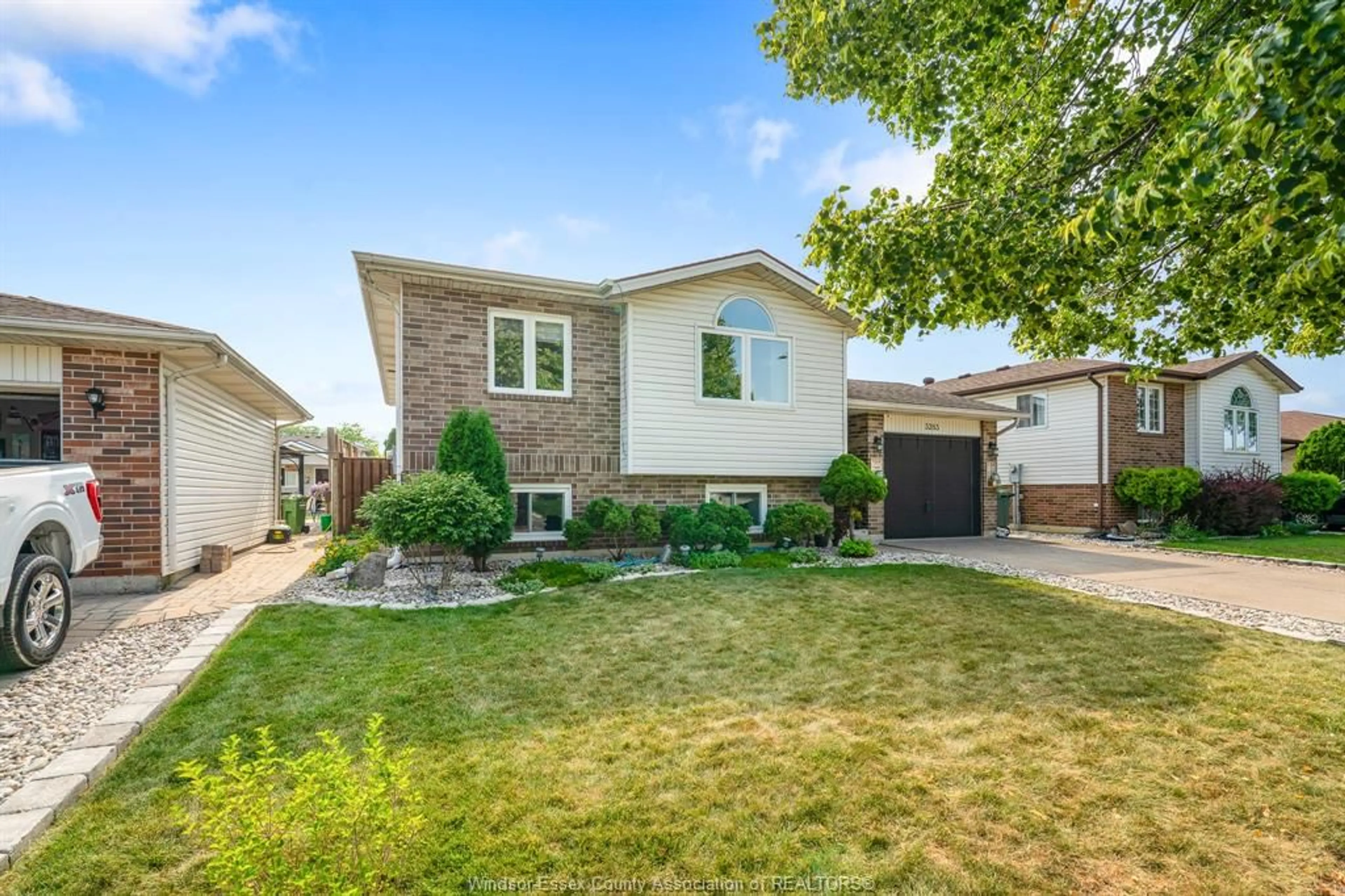 Home with brick exterior material, street for 3283 Blairwood Crt, Windsor Ontario N8W 5M7