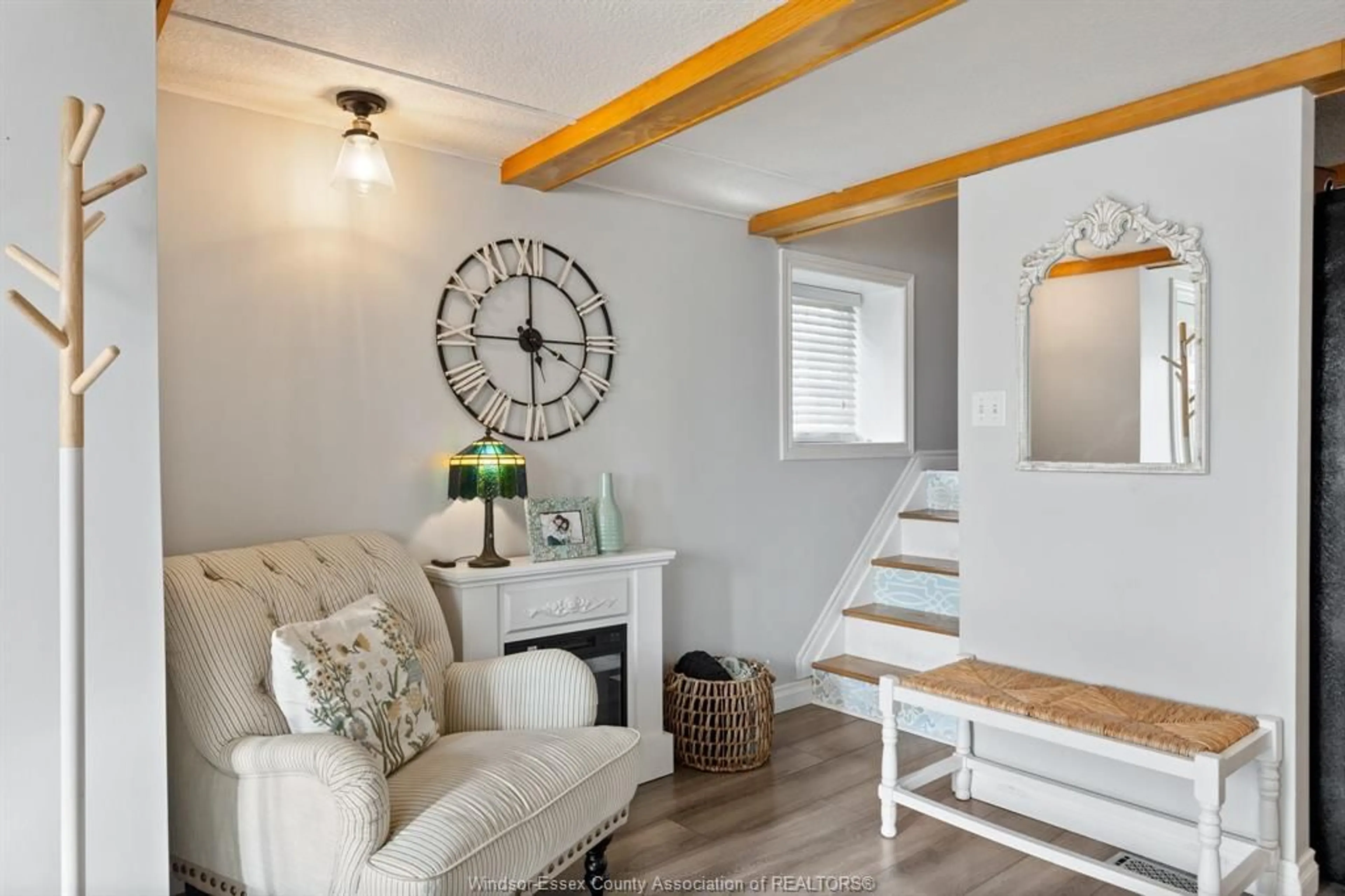 Living room with furniture, wood/laminate floor for 273 St John, Belle River Ontario N0R 1A0