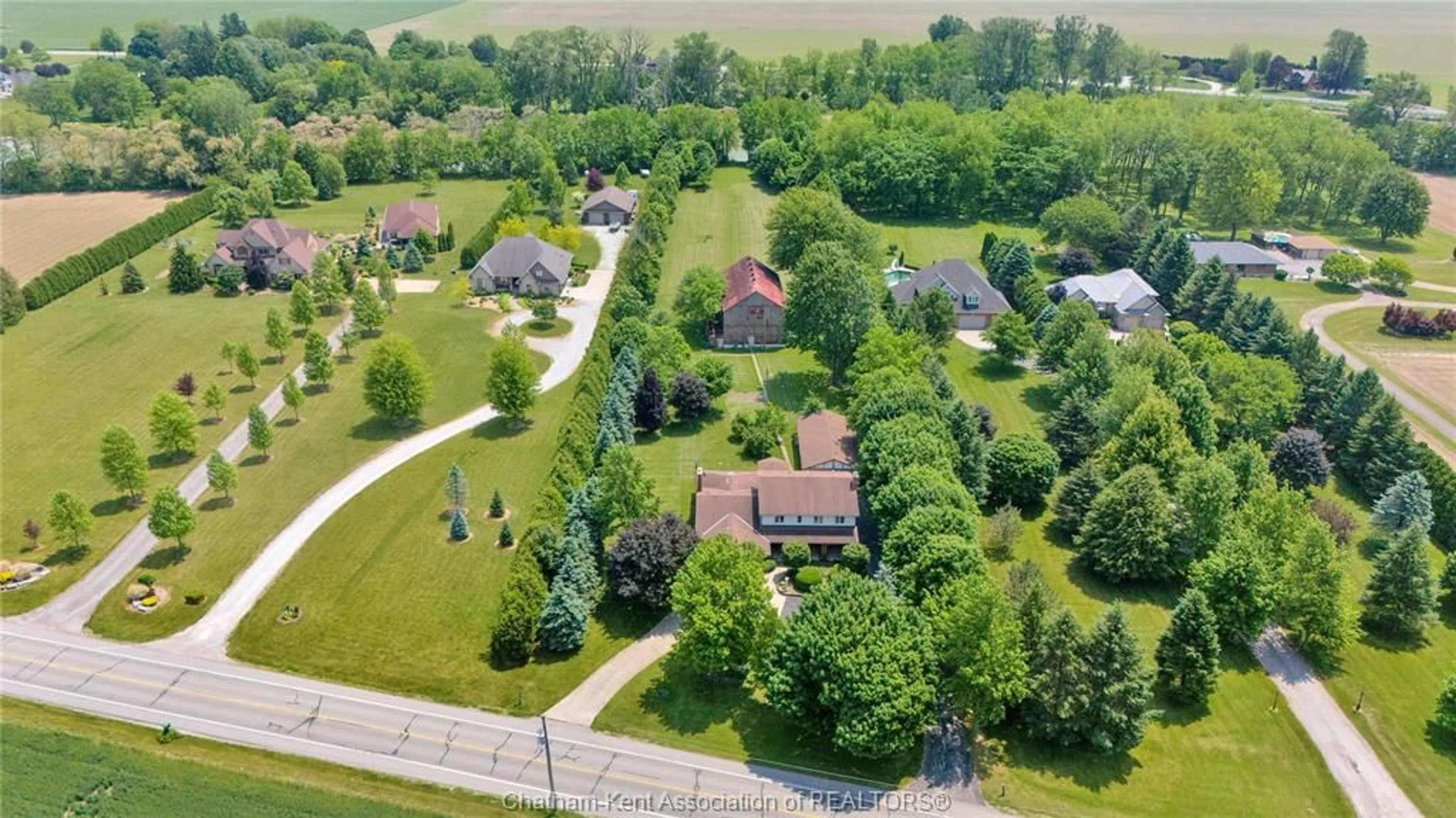 A pic from outside/outdoor area/front of a property/back of a property/a pic from drone, street for 7308 Grande River Line, Chatham Ontario N7M 0N3