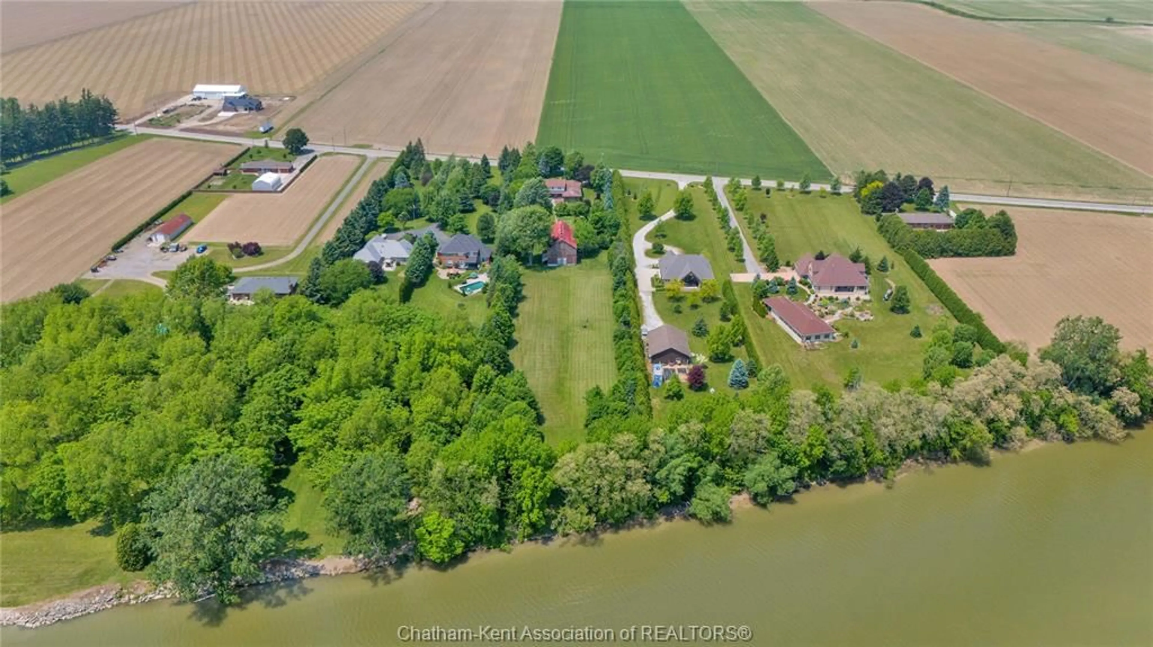 A pic from outside/outdoor area/front of a property/back of a property/a pic from drone, water/lake/river/ocean view for 7308 Grande River Line, Chatham Ontario N7M 0N3
