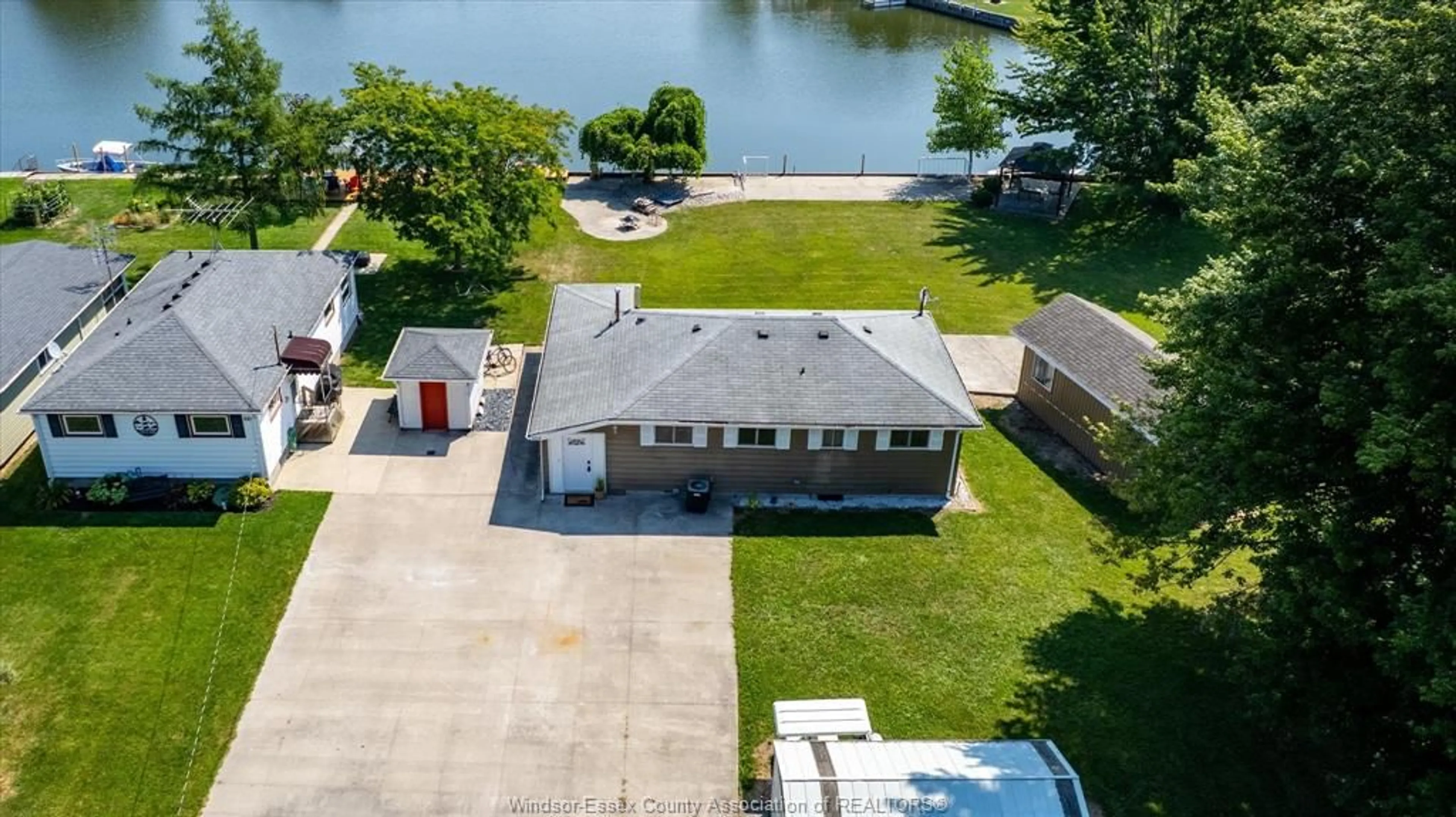 A pic from outside/outdoor area/front of a property/back of a property/a pic from drone, water/lake/river/ocean view for 334 ISLAND Cres, Lighthouse Cove Ontario N0P 2L0