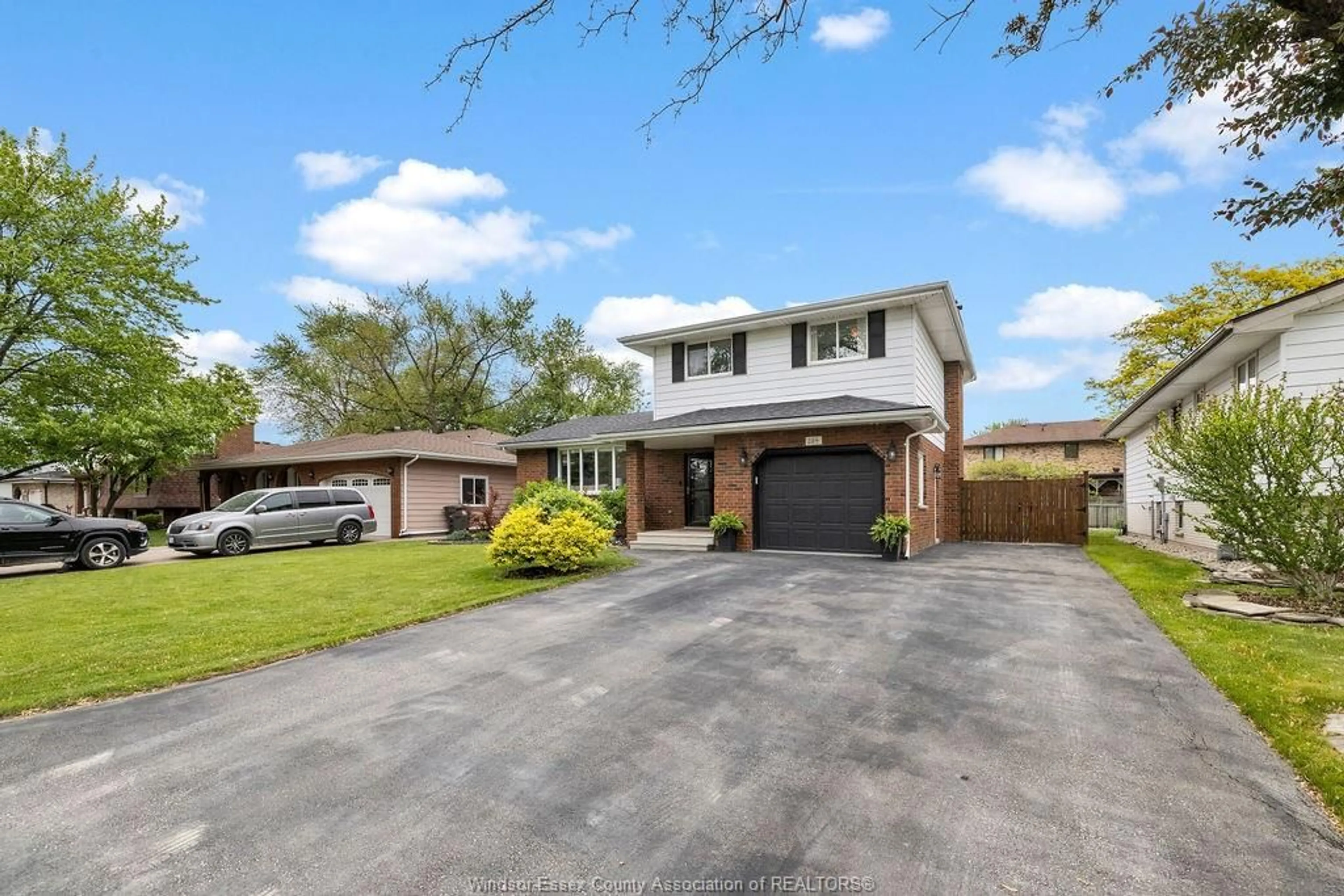 Home with brick exterior material, street for 384 CENTENNIAL Dr, Tecumseh Ontario N8N 2P2