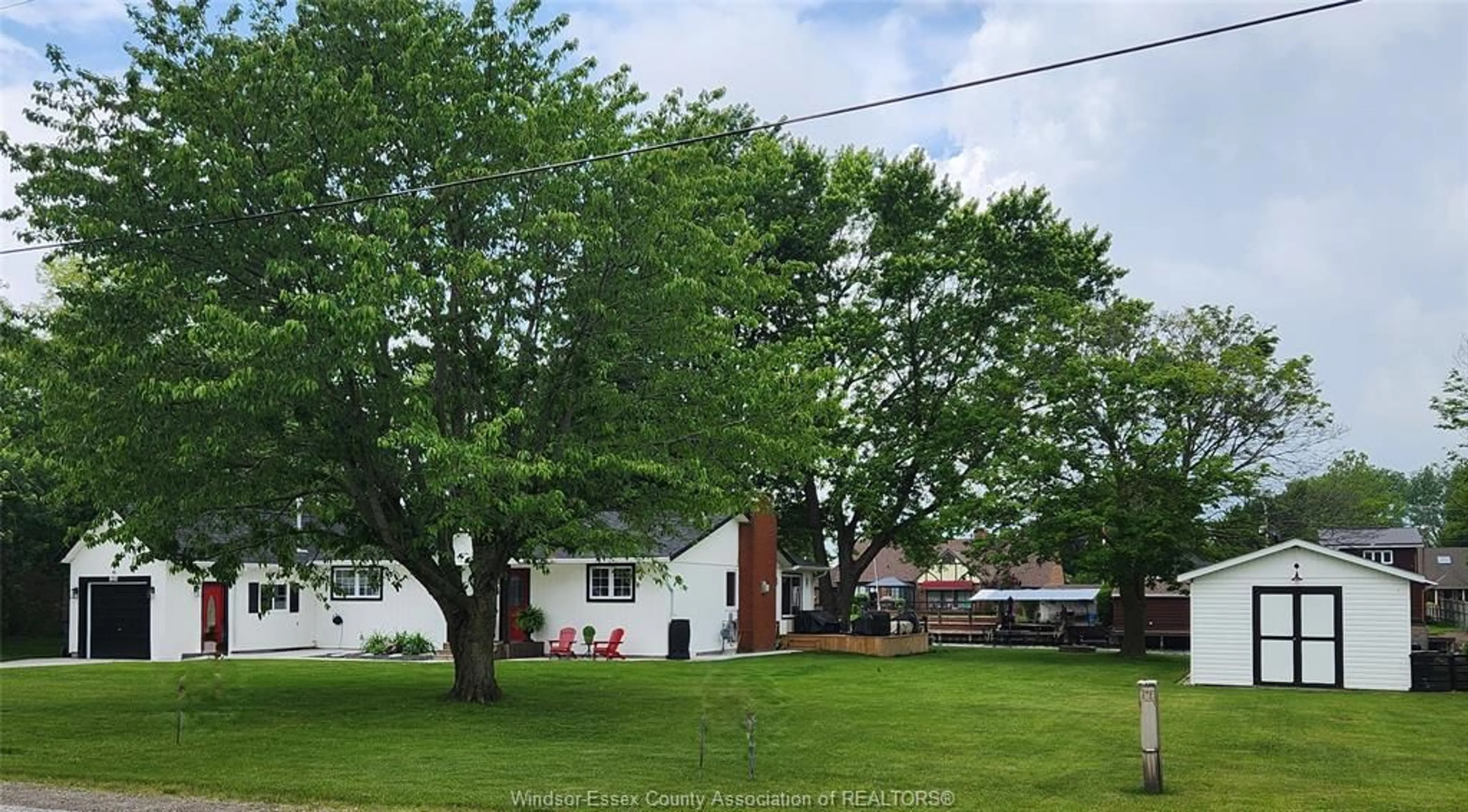 A pic from outside/outdoor area/front of a property/back of a property/a pic from drone, street for 845 REAUME Dr, Tilbury North Ontario N0P 2L0