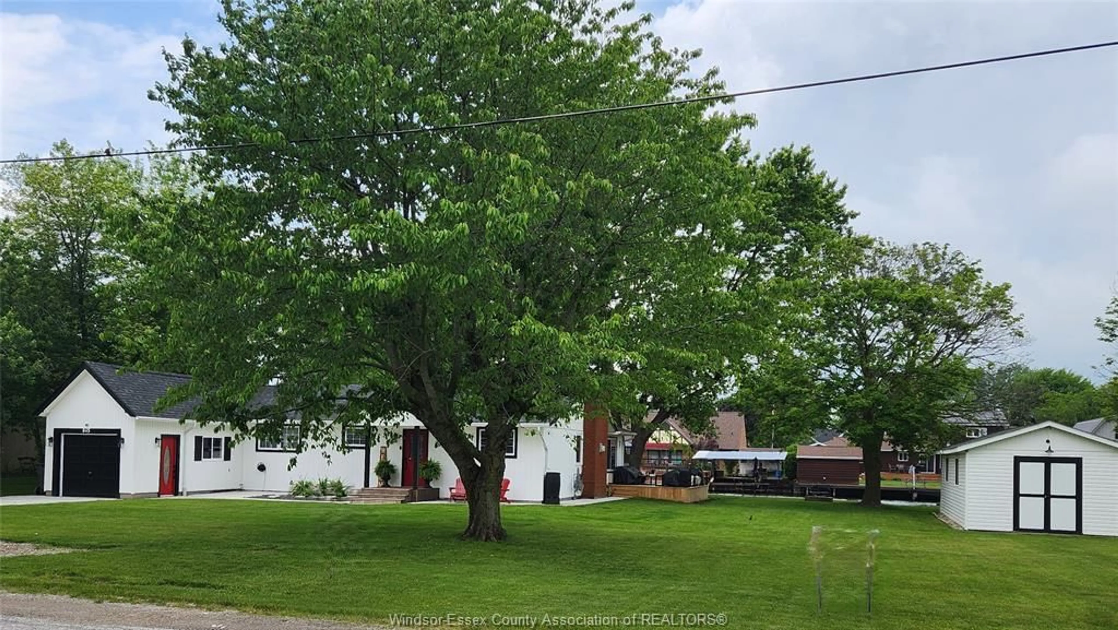 A pic from outside/outdoor area/front of a property/back of a property/a pic from drone, street for 845 REAUME Dr, Tilbury North Ontario N0P 2L0