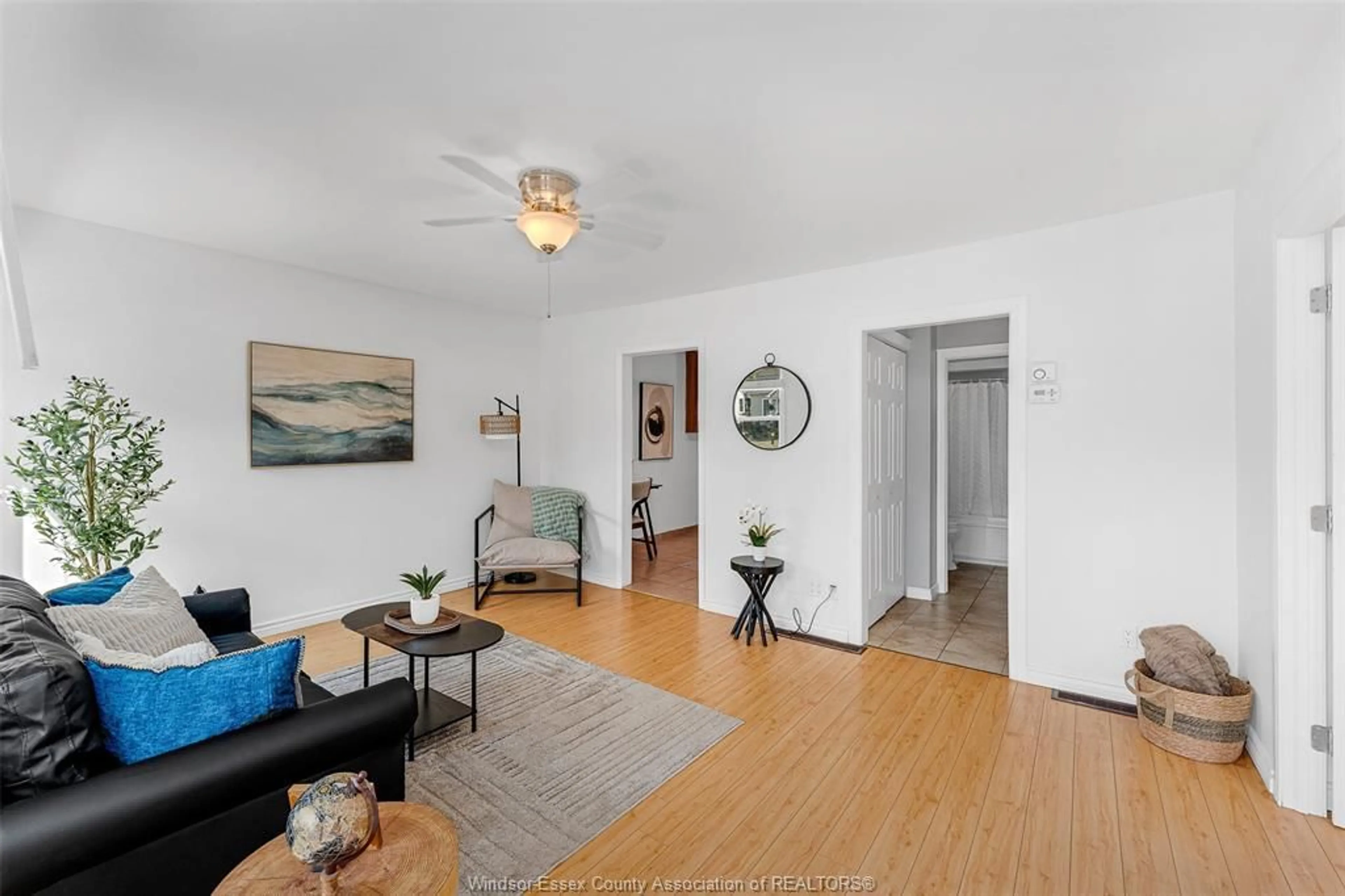 Living room with furniture, wood/laminate floor for 1630 GEORGE, Windsor Ontario N8Y 2Y6