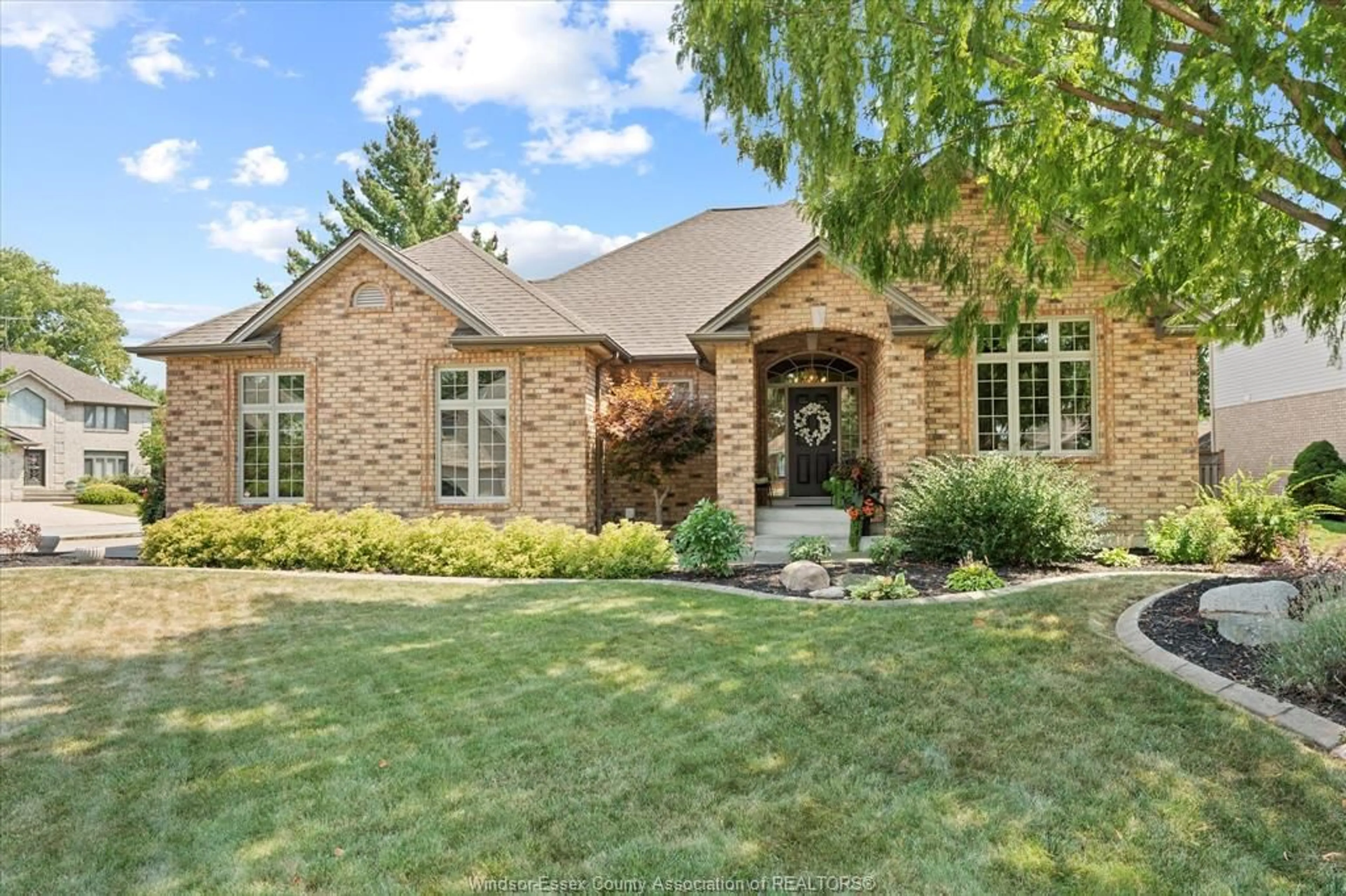 Home with brick exterior material, street for 167 PHEASANT RUN Dr, Lakeshore Ontario N8L 0Z8