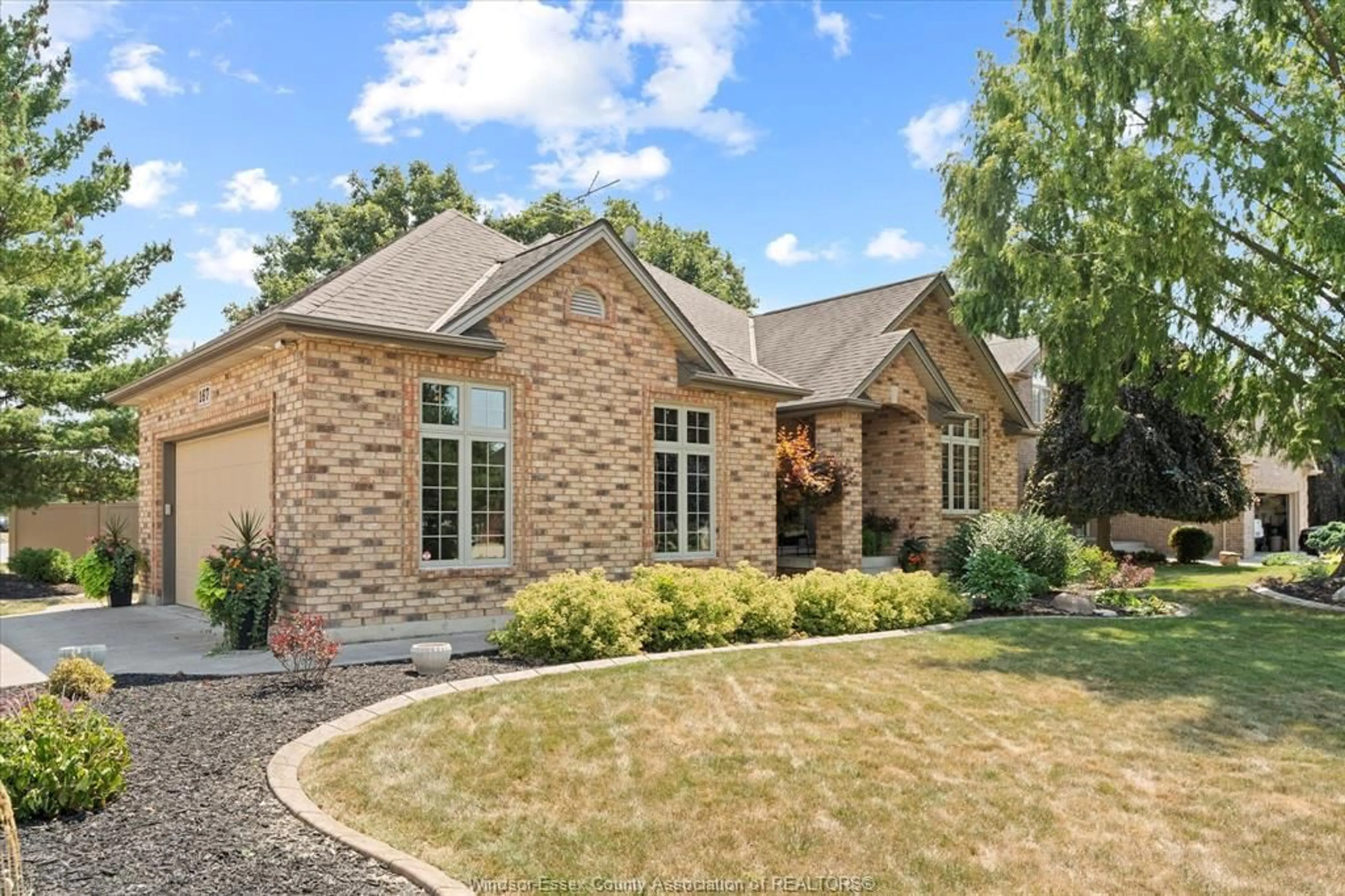Home with brick exterior material, street for 167 PHEASANT RUN Dr, Lakeshore Ontario N8L 0Z8