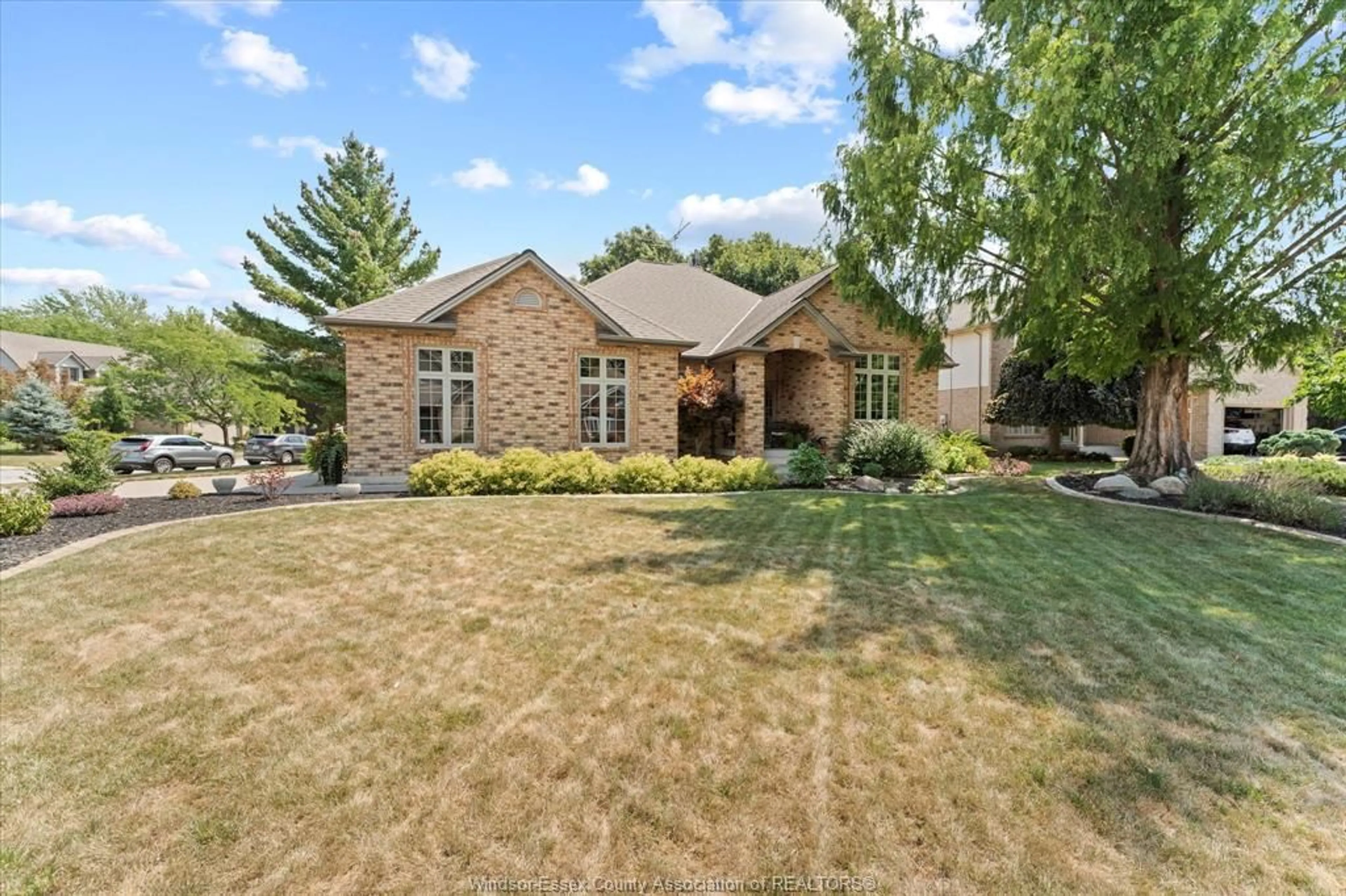 Home with brick exterior material, street for 167 PHEASANT RUN Dr, Lakeshore Ontario N8L 0Z8