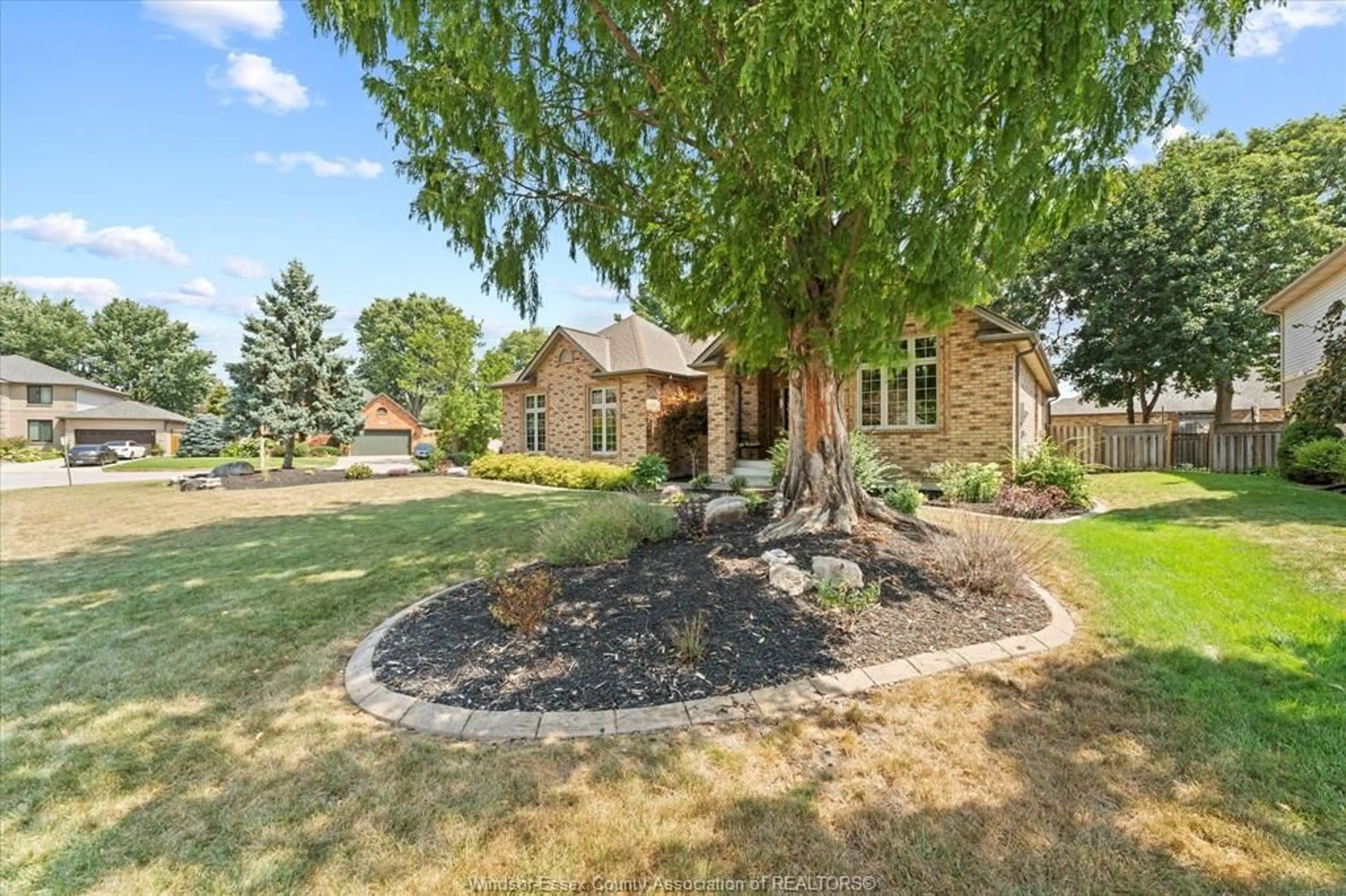 Home with brick exterior material, street for 167 PHEASANT RUN Dr, Lakeshore Ontario N8L 0Z8