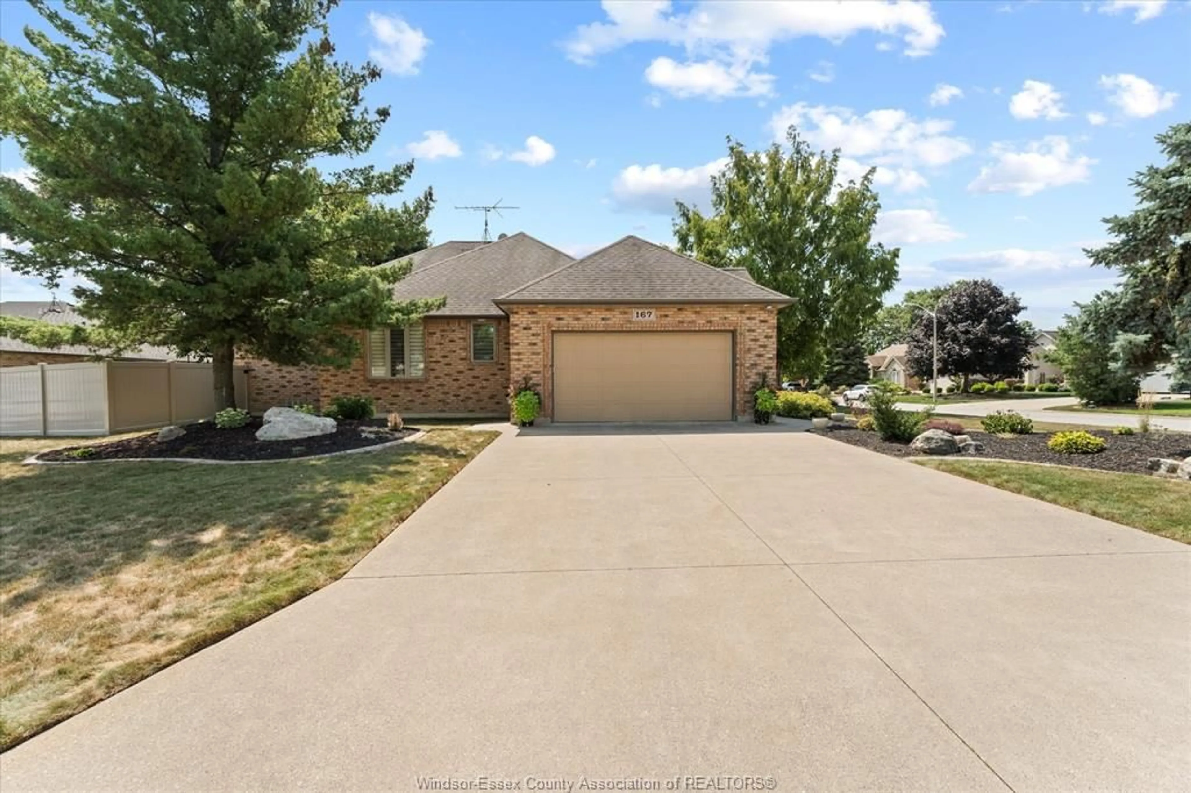 A pic from outside/outdoor area/front of a property/back of a property/a pic from drone, street for 167 PHEASANT RUN Dr, Lakeshore Ontario N8L 0Z8