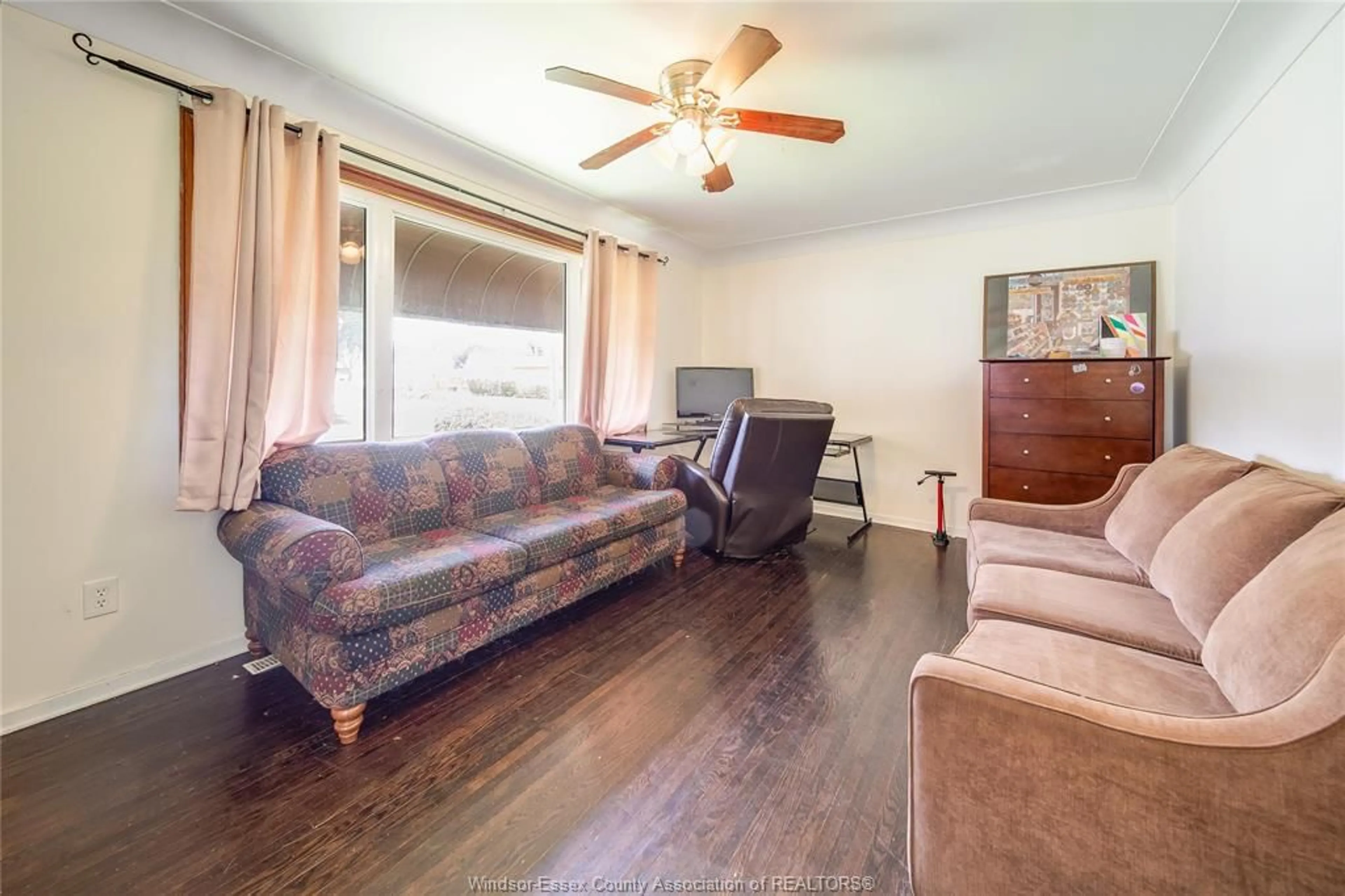 Living room with furniture, wood/laminate floor for 1104 HARRISON Ave, Windsor Ontario N9C 3J5