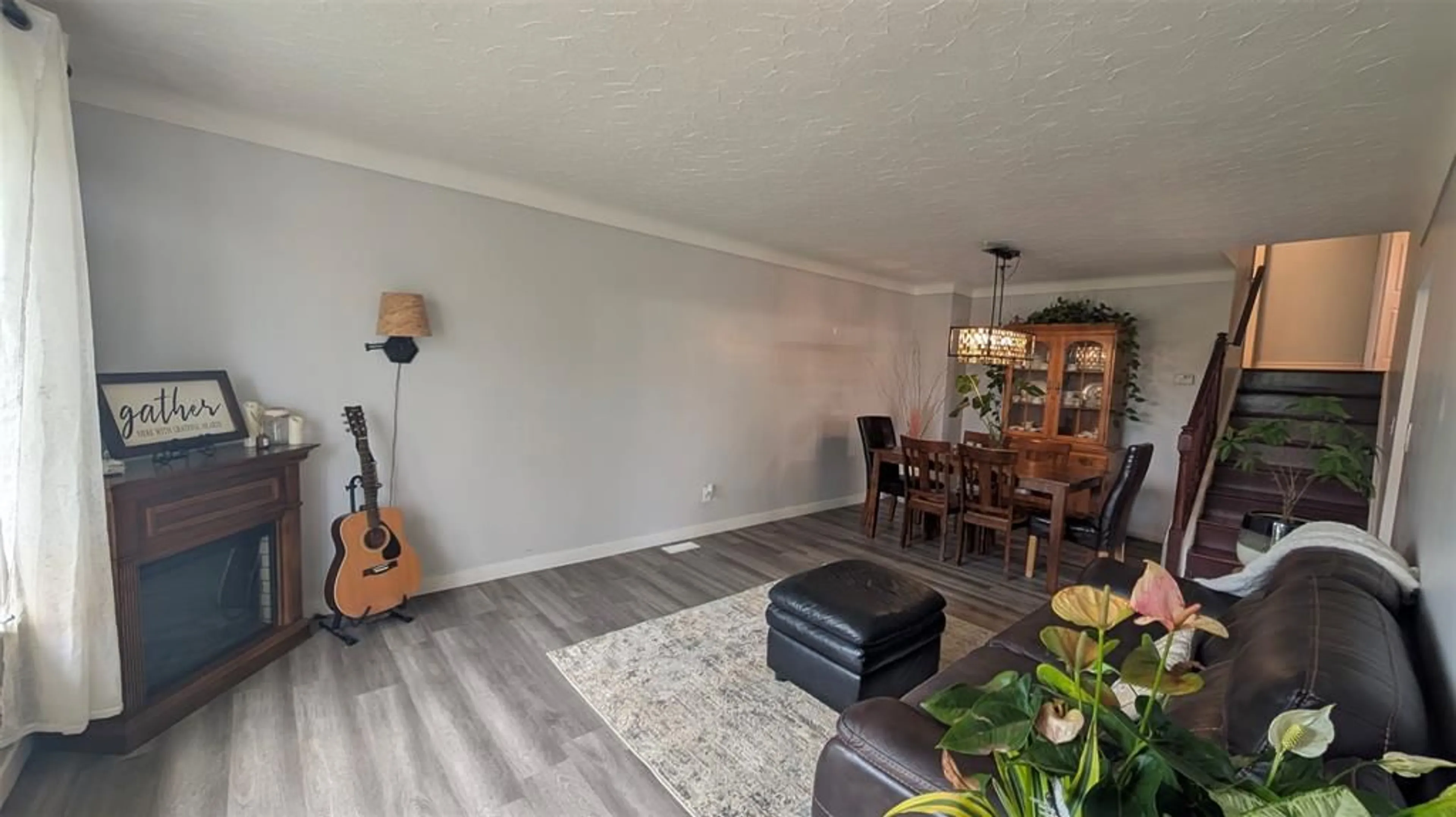 Living room with furniture, wood/laminate floor for 44 YORK Cres, Sarnia Ontario N7S 4L4