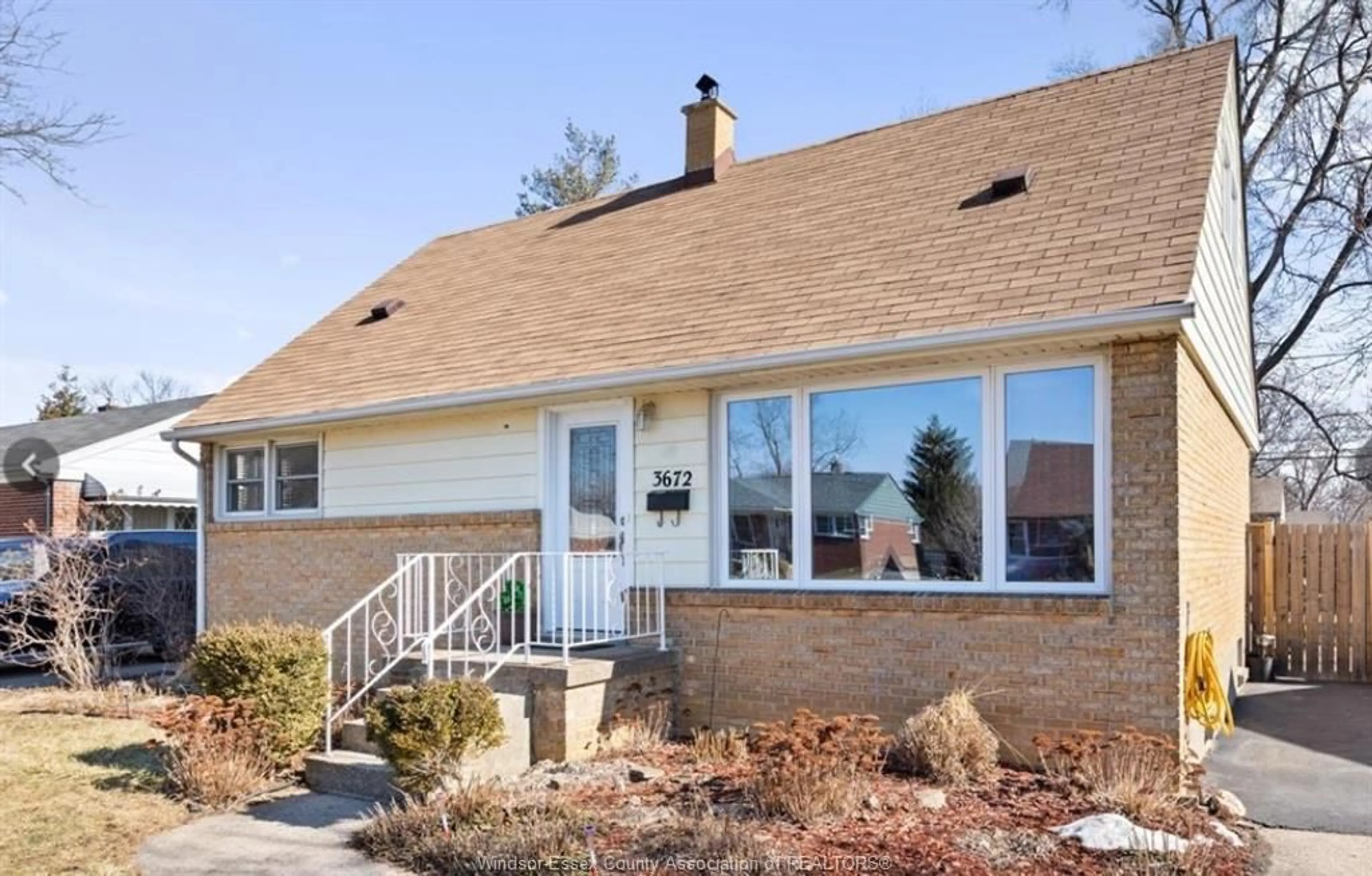 Home with brick exterior material, street for 3672 MORRIS Dr, Windsor Ontario N9E 2K7
