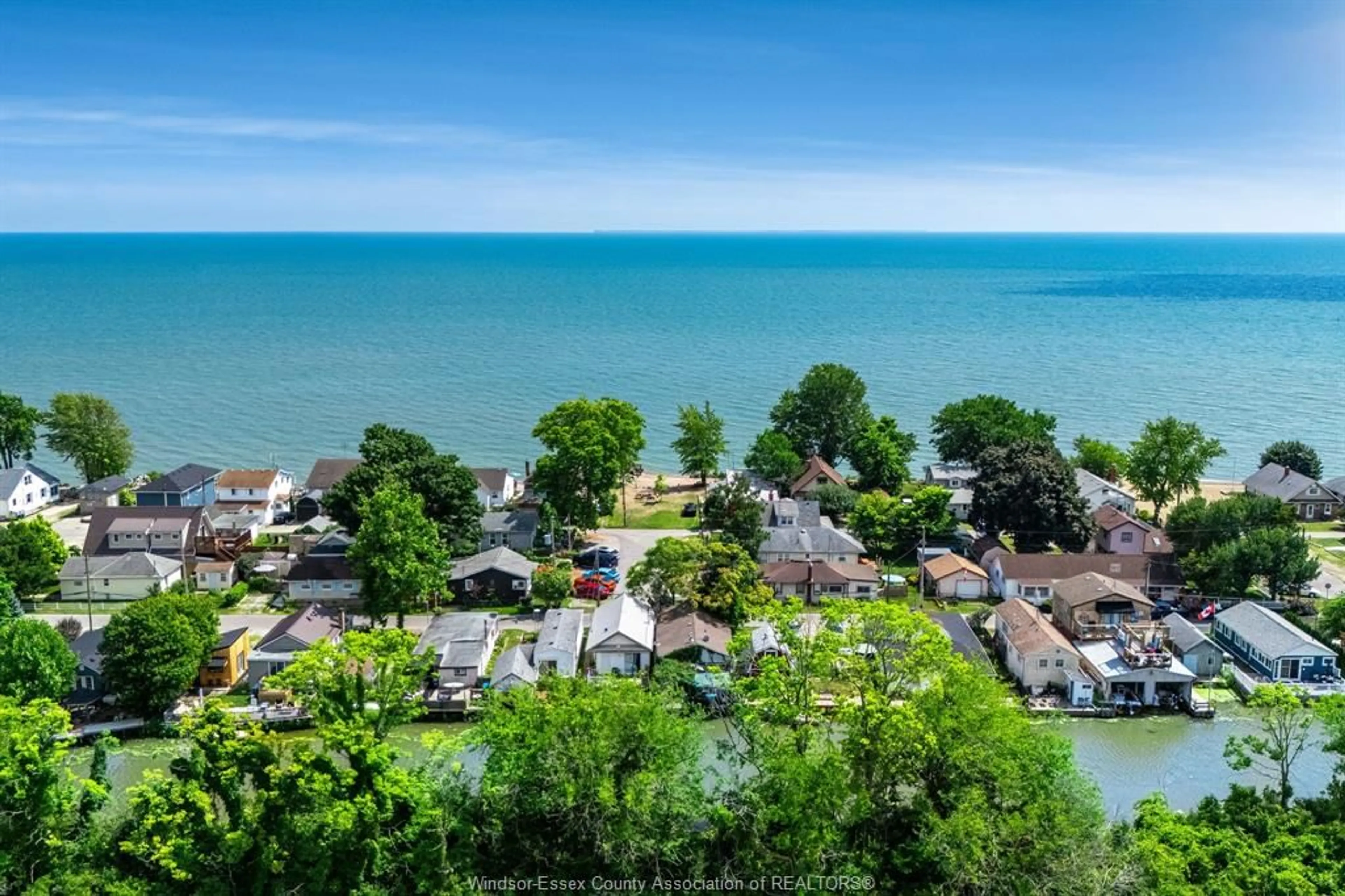 A pic from outside/outdoor area/front of a property/back of a property/a pic from drone, water/lake/river/ocean view for 561 3rd Blvd, Kingsville Ontario N9Y 3W2