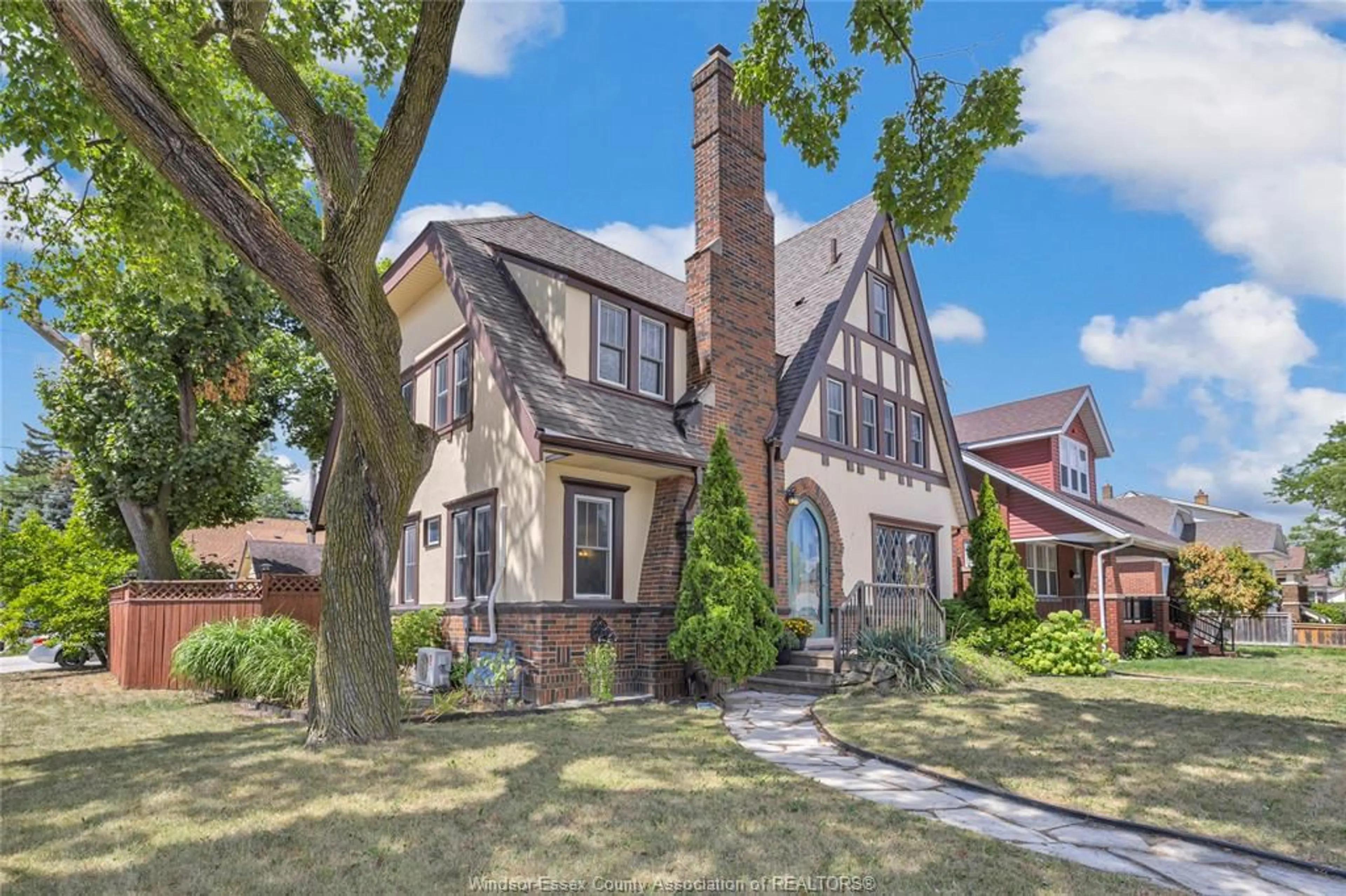 Home with brick exterior material, street for 2195 Kildare Rd, Windsor Ontario N8W 2W9