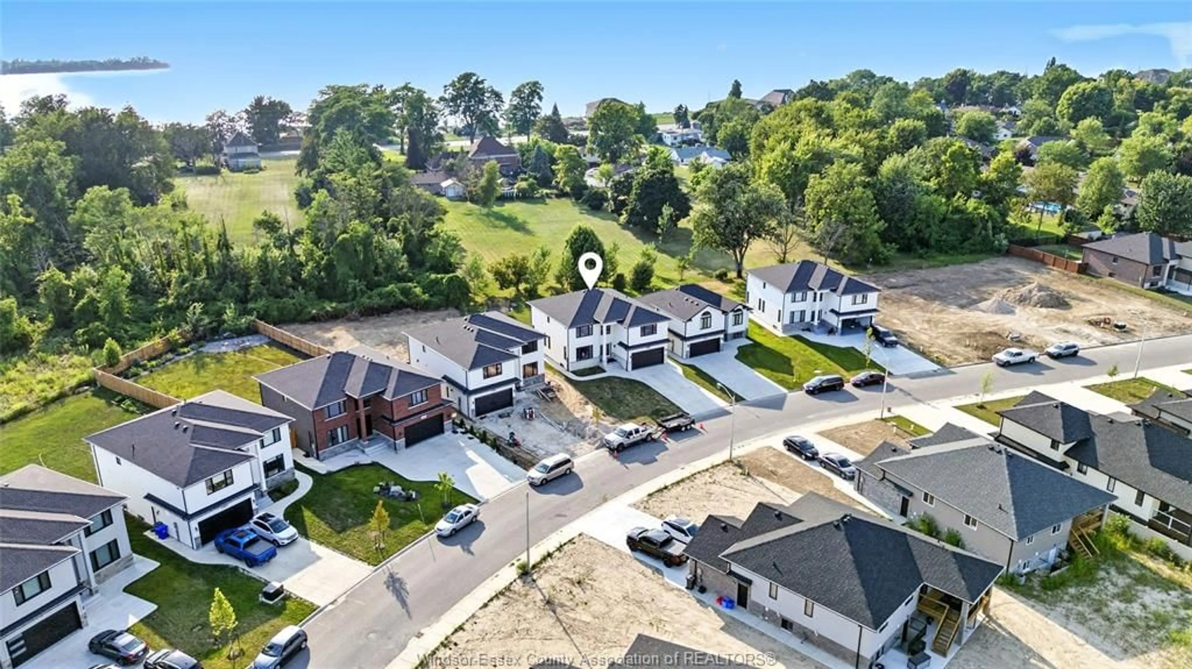 A pic from outside/outdoor area/front of a property/back of a property/a pic from drone, unknown for 27 KINGSBRIDGE Dr, Amherstburg Ontario N9V 4A4