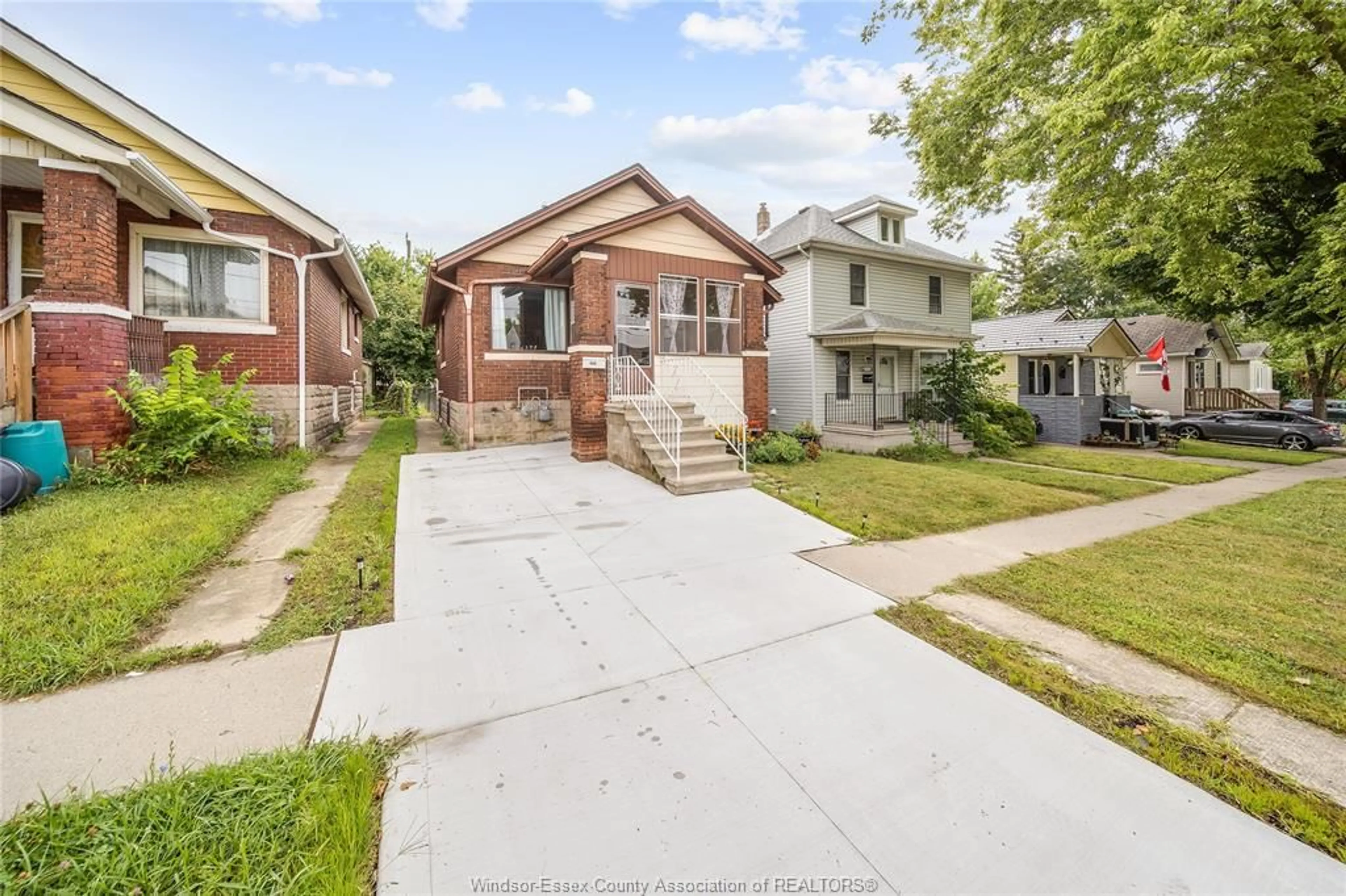 Home with brick exterior material, street for 686 MCKAY Ave, Windsor Ontario N9B 2A1