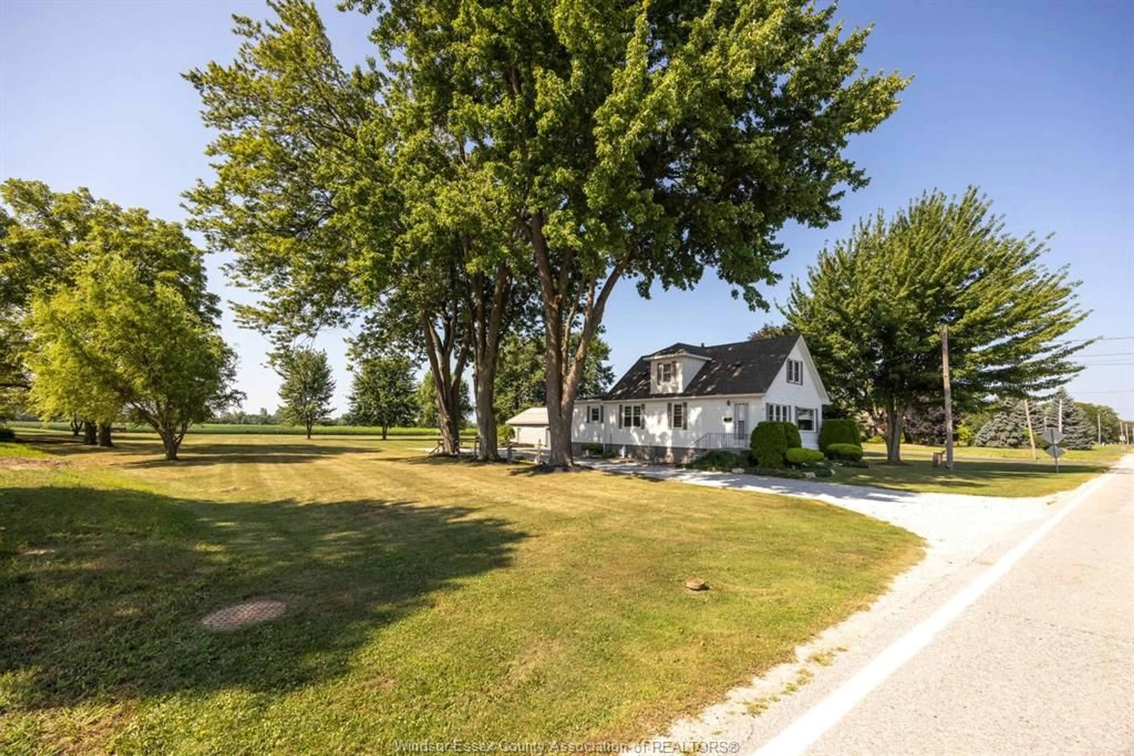 A pic from outside/outdoor area/front of a property/back of a property/a pic from drone, street for 702 MARTIN Lane, LaSalle Ontario N9J 2W8