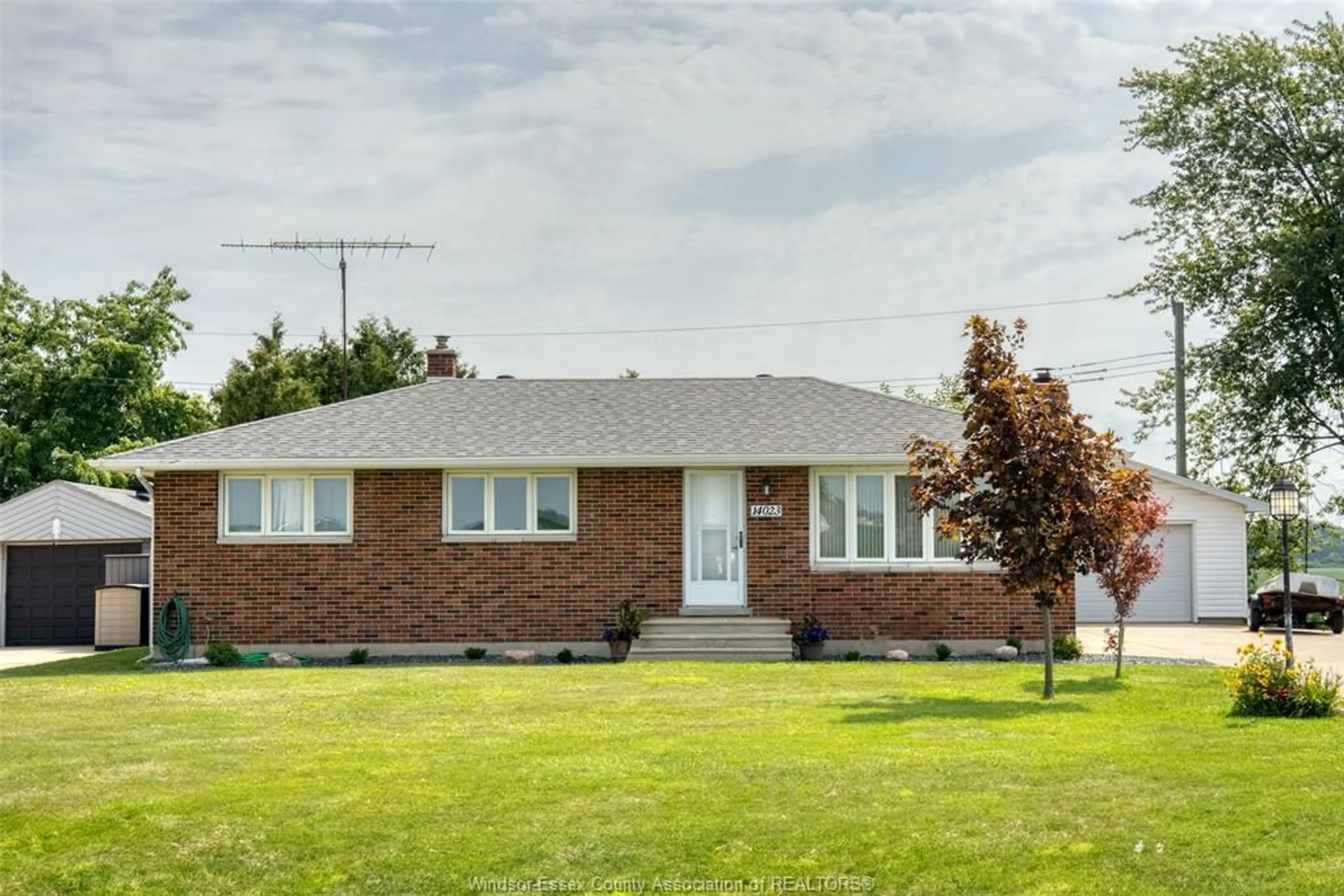 Home with brick exterior material, street for 14023 COUNTY ROAD 11, Essex Ontario N0R 1J0