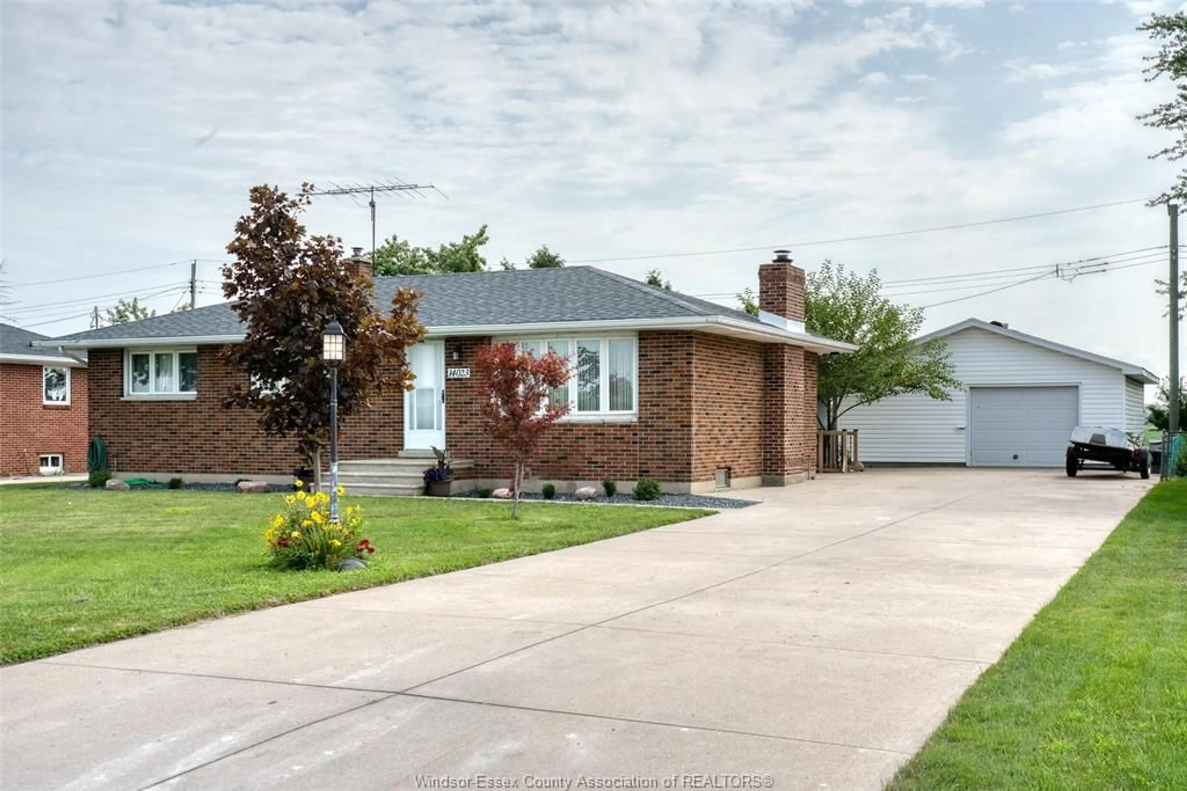 Home with brick exterior material, street for 14023 COUNTY ROAD 11, Essex Ontario N0R 1J0