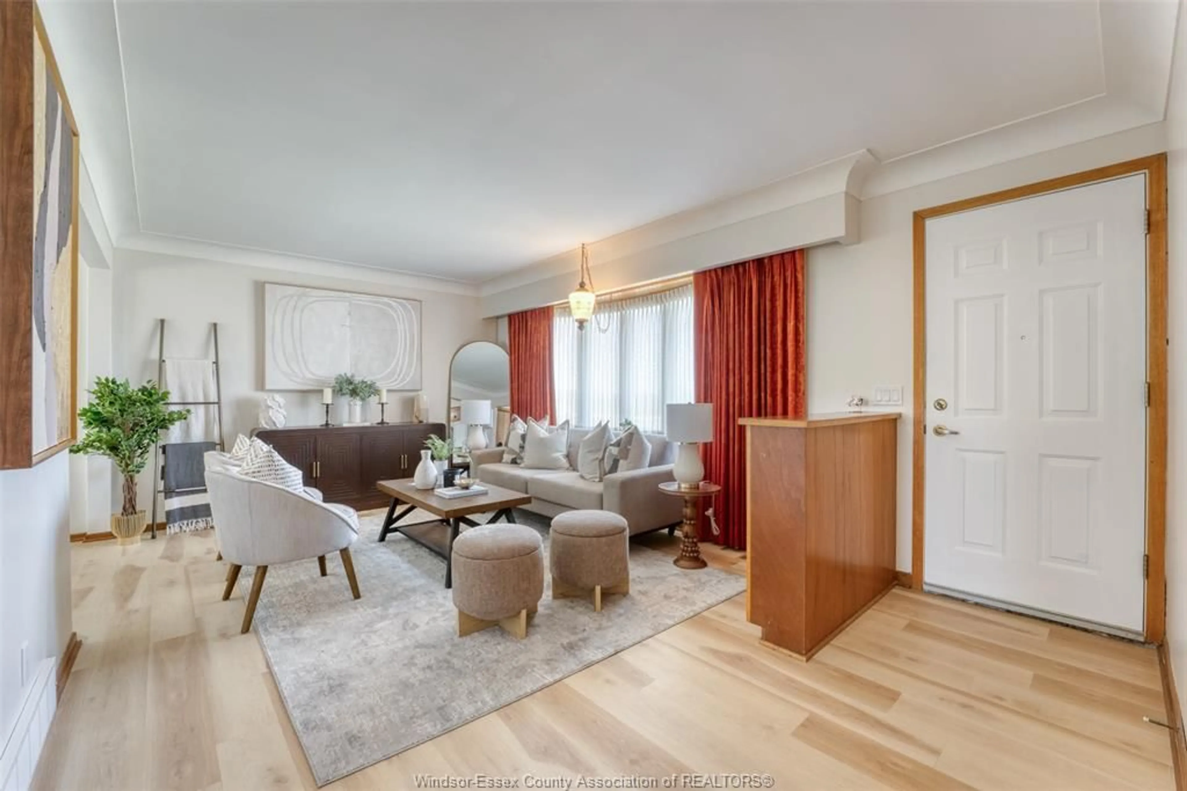 Living room with furniture, wood/laminate floor for 14023 COUNTY ROAD 11, Essex Ontario N0R 1J0