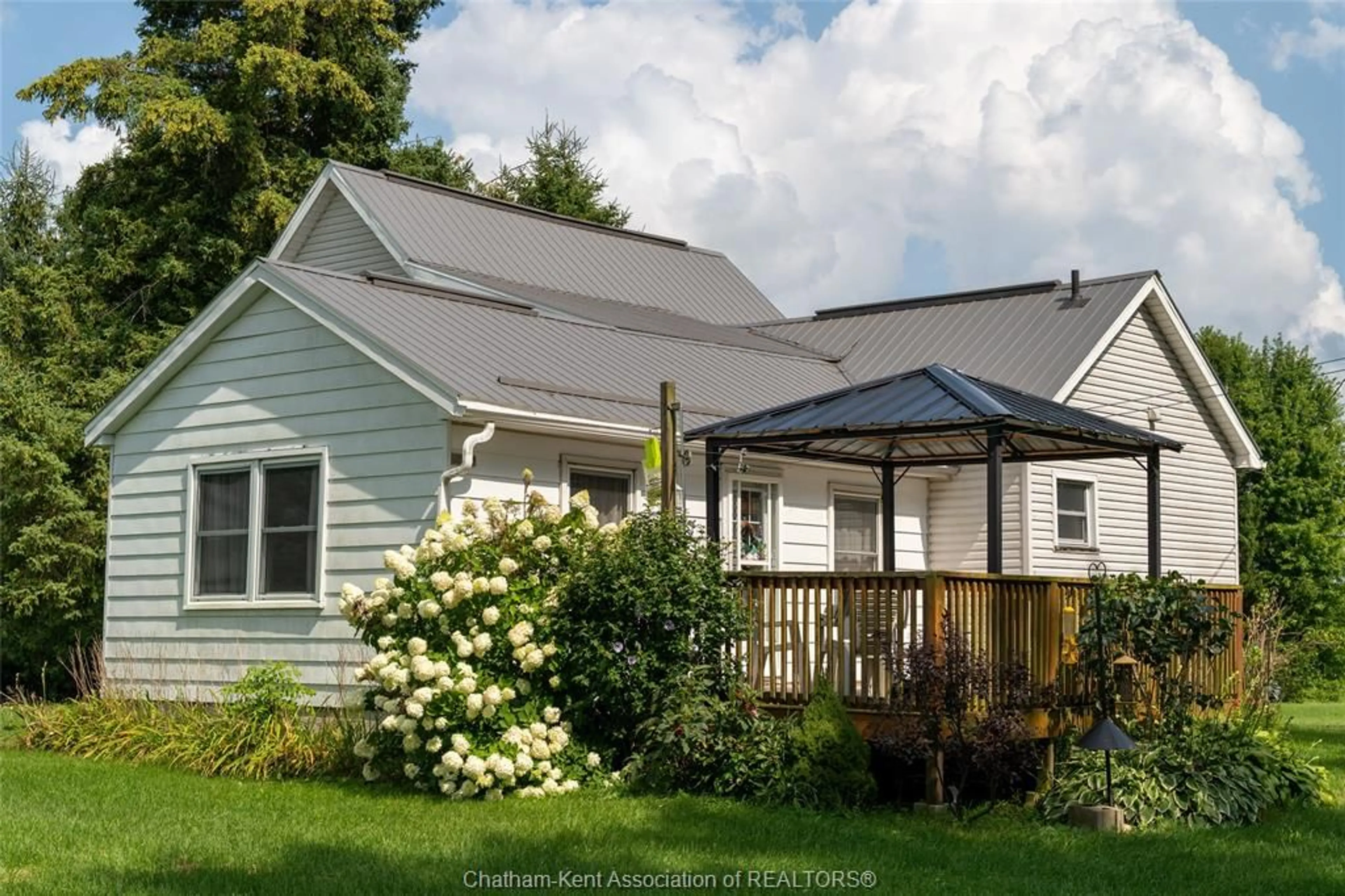 Home with vinyl exterior material, street for 2470 Concession Dr, Newbury Ontario N0L 1Z0