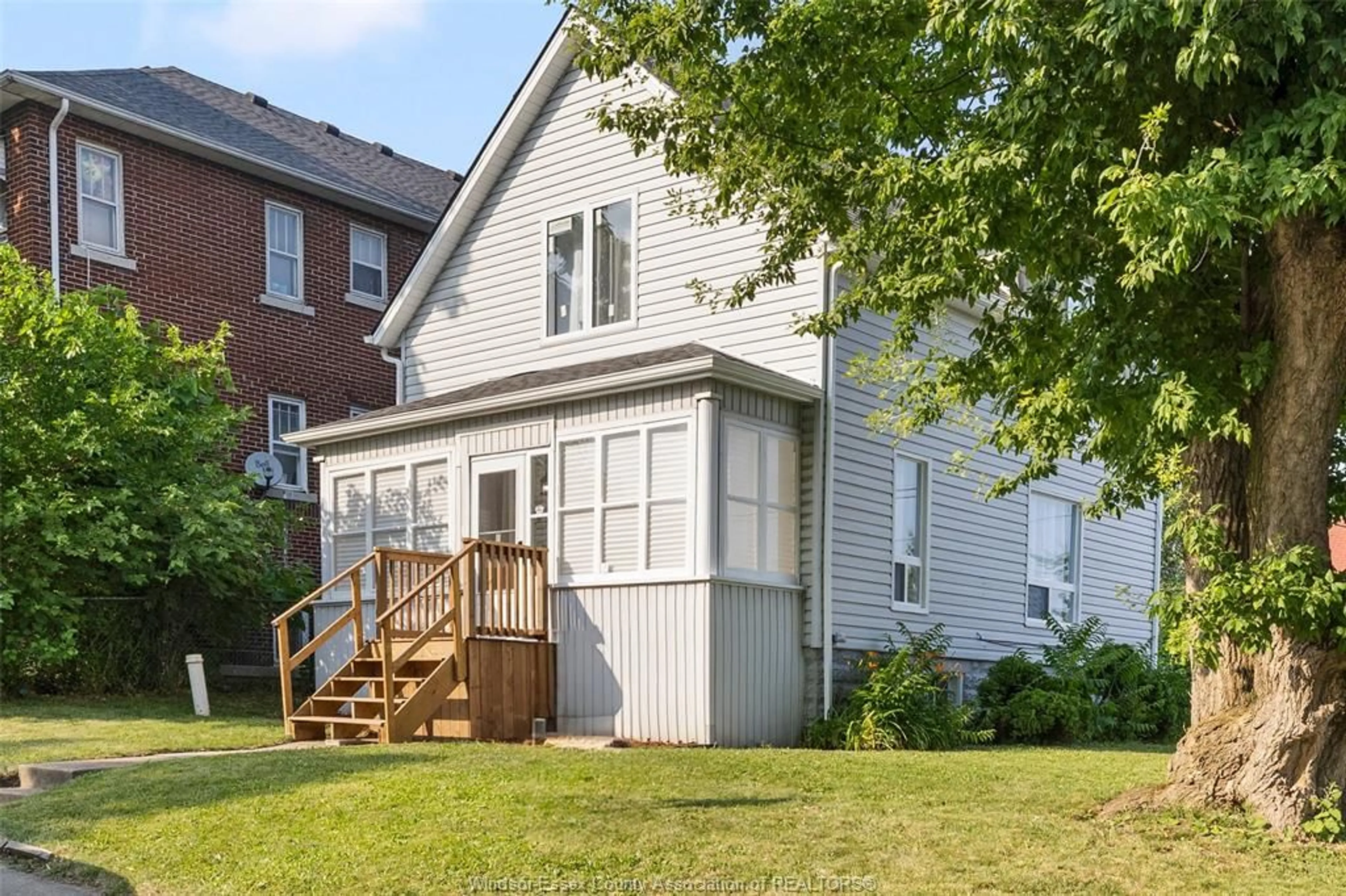 Home with vinyl exterior material, street for 488 PARENT Ave, Windsor Ontario N9A 2C1