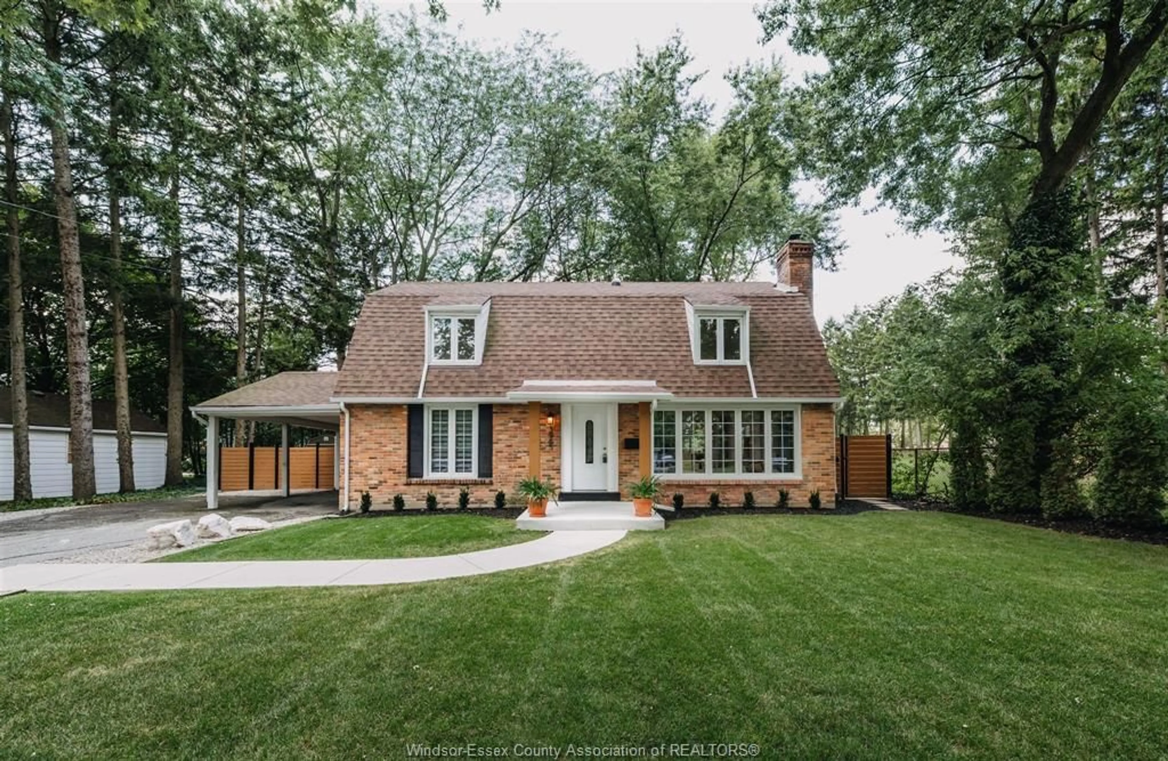 Home with brick exterior material, street for 3965 Kennedy Dr, Windsor Ontario N9G 1X6