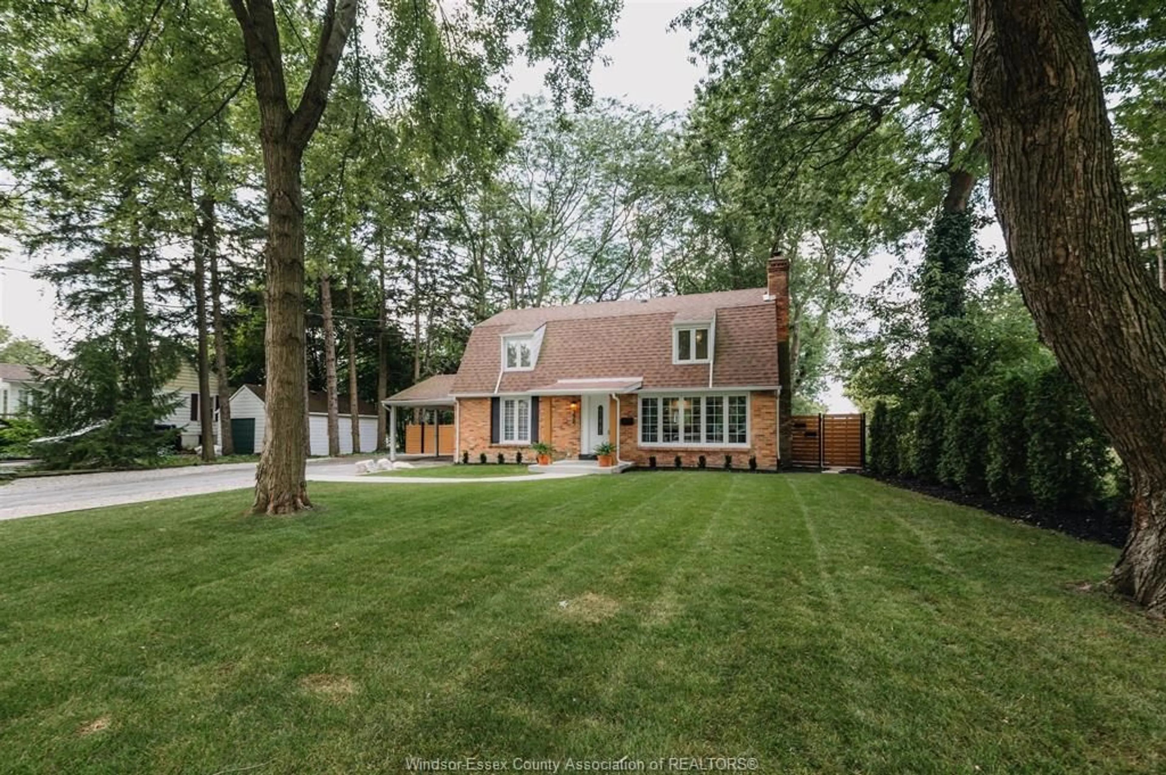 Home with brick exterior material, street for 3965 Kennedy Dr, Windsor Ontario N9G 1X6