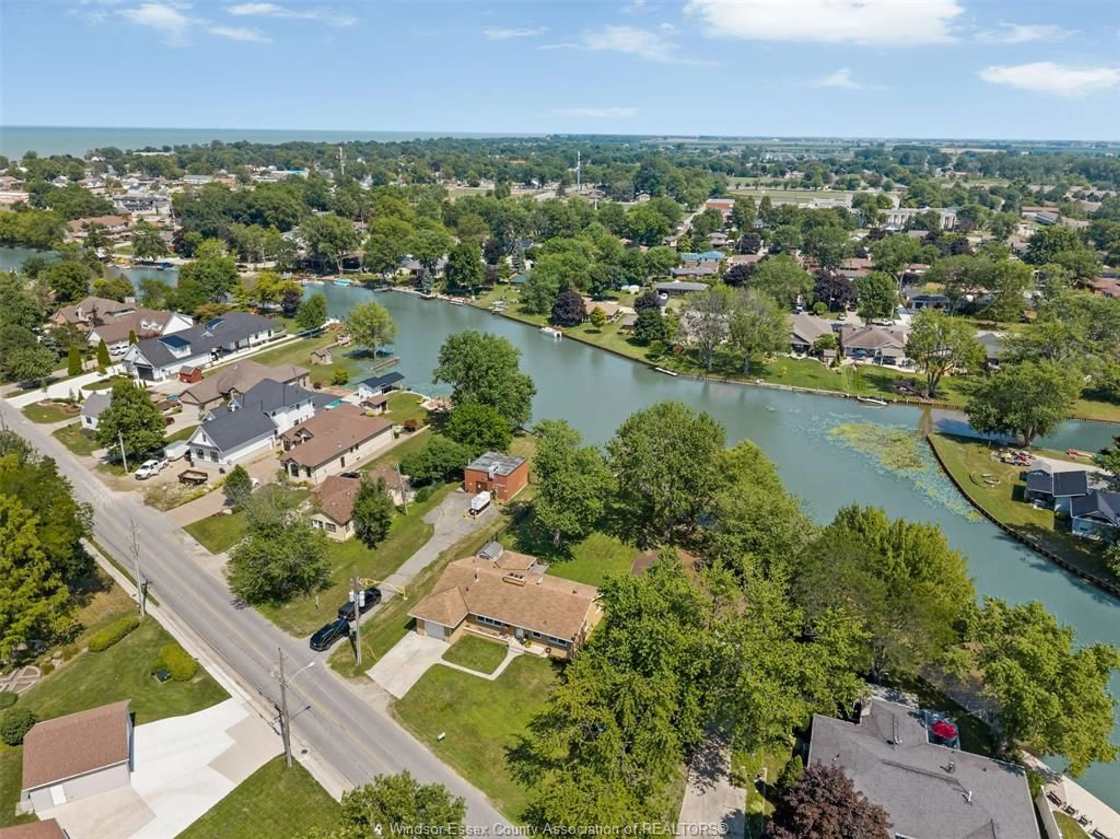 A pic from outside/outdoor area/front of a property/back of a property/a pic from drone, water/lake/river/ocean view for 341 W BELLE RIVER Rd, Lakeshore Ontario N8L 0K7