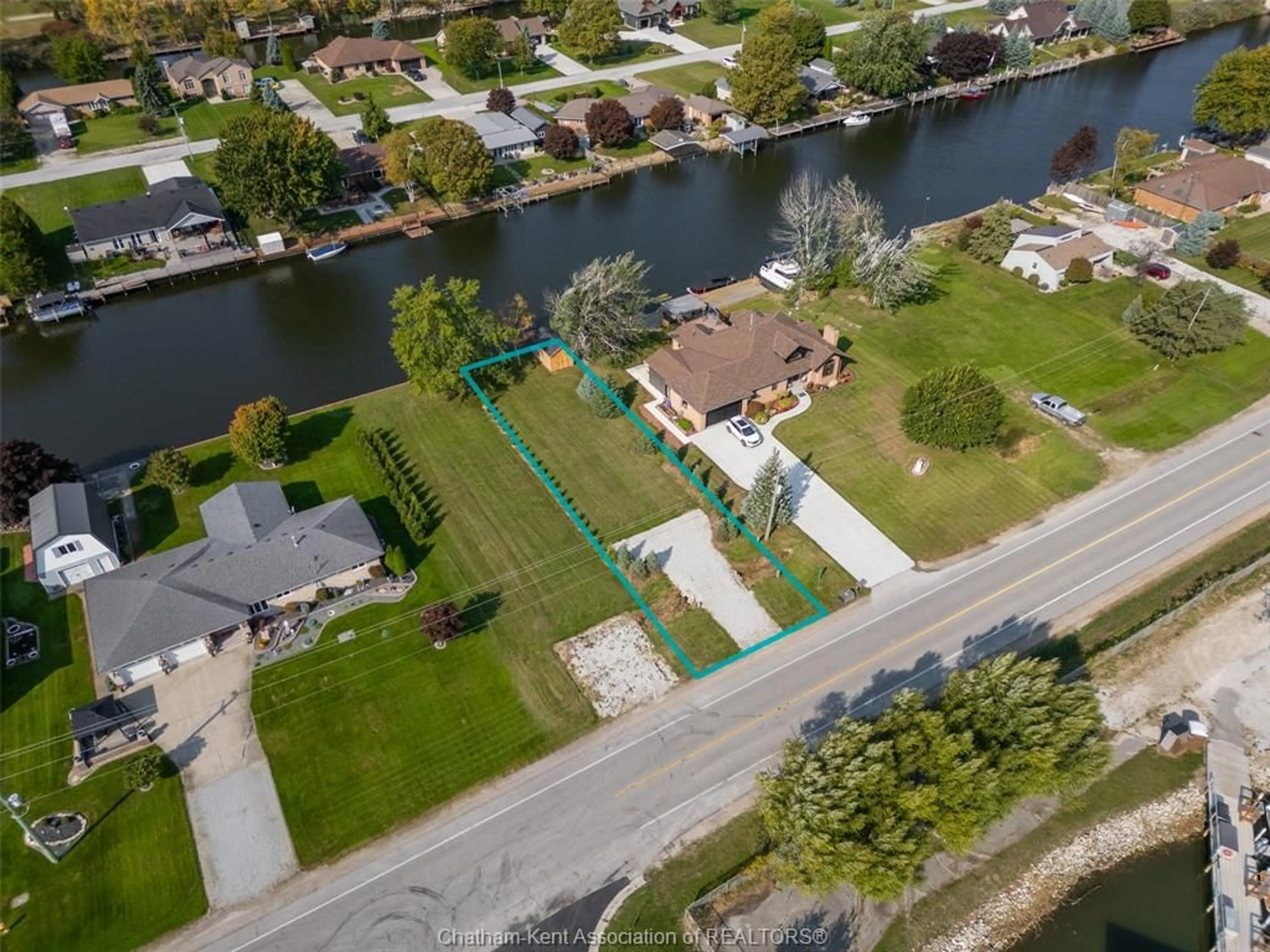 A pic from outside/outdoor area/front of a property/back of a property/a pic from drone, water/lake/river/ocean view for 705 Tisdelle Dr, Lakeshore Ontario N0P 2L0